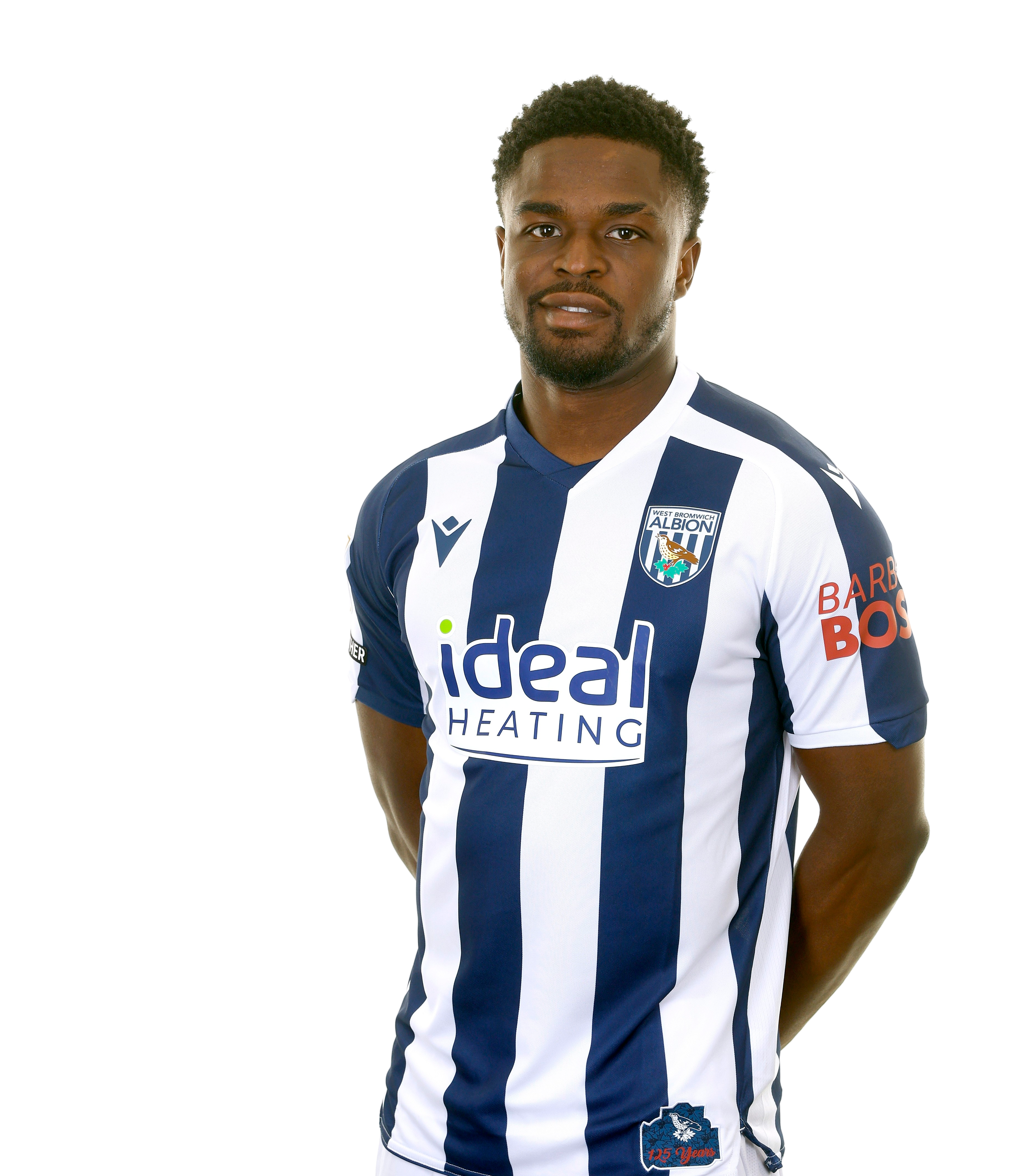A photo of Albion forward Josh Maja in the 2025/26 home kit