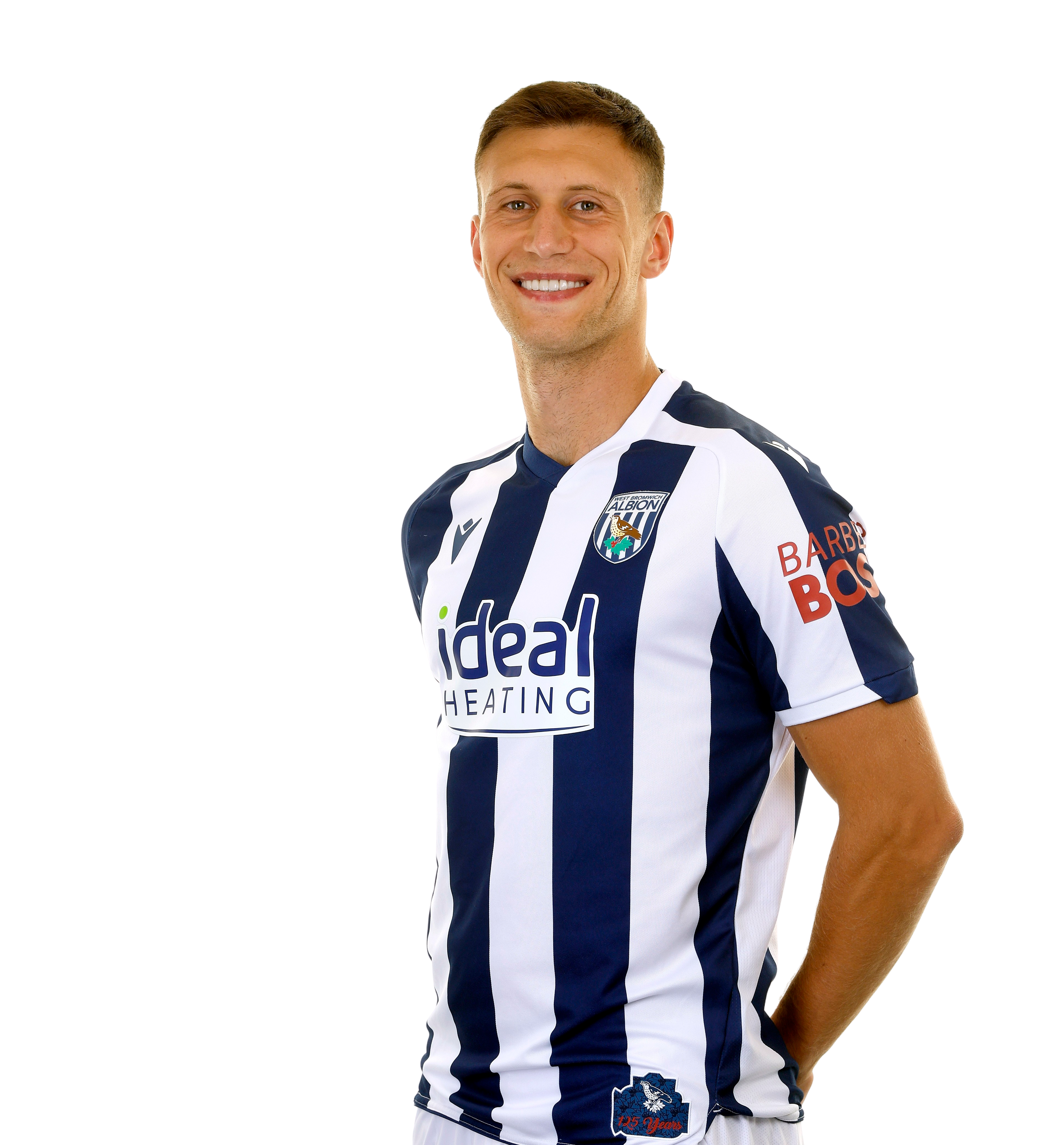 A photo headshot of Krystian Bielik in the 2025/26 home kit