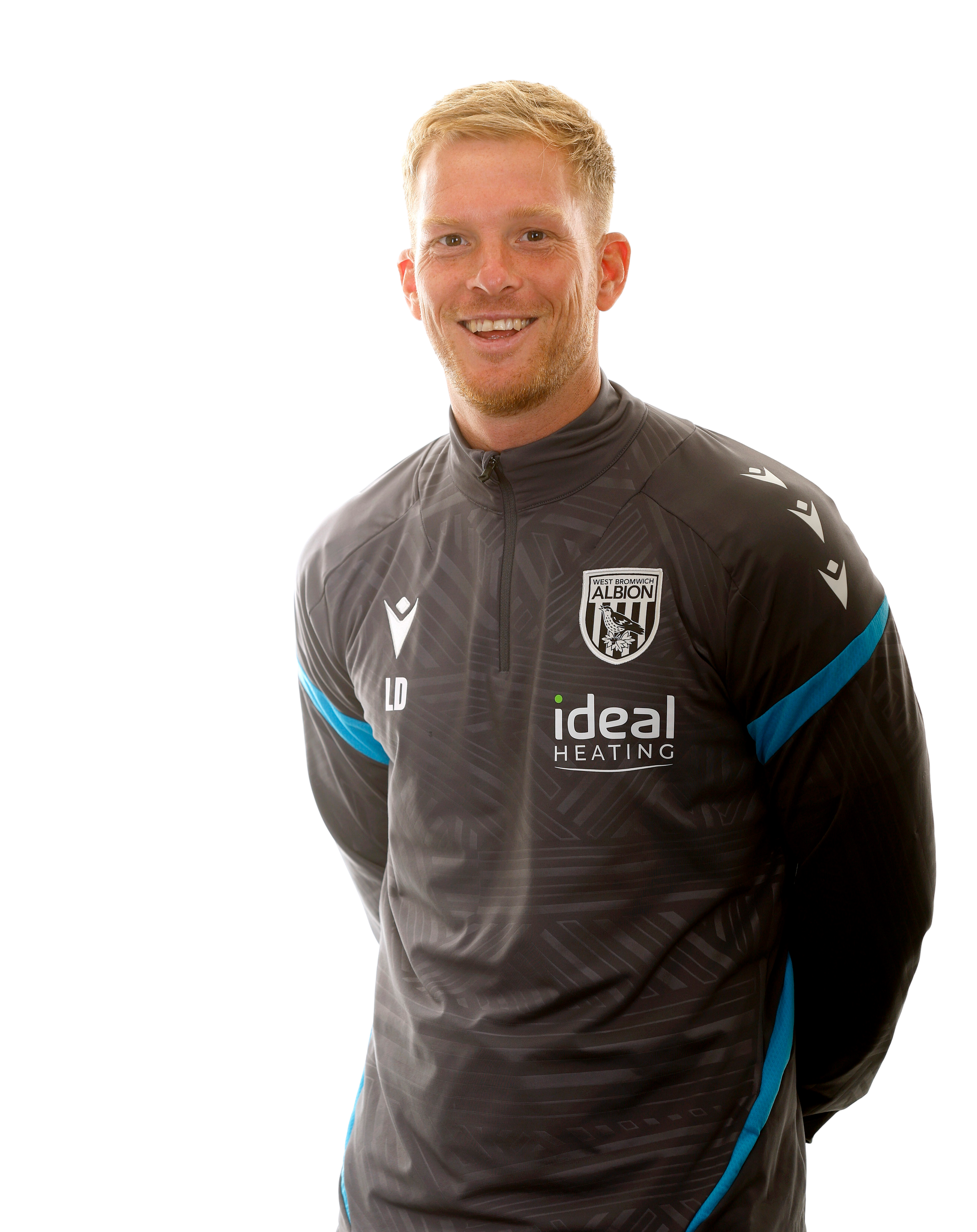 A photo of Albion Lead U18 PDP Coach Leigh Downing in the 2025/26 grey training kit