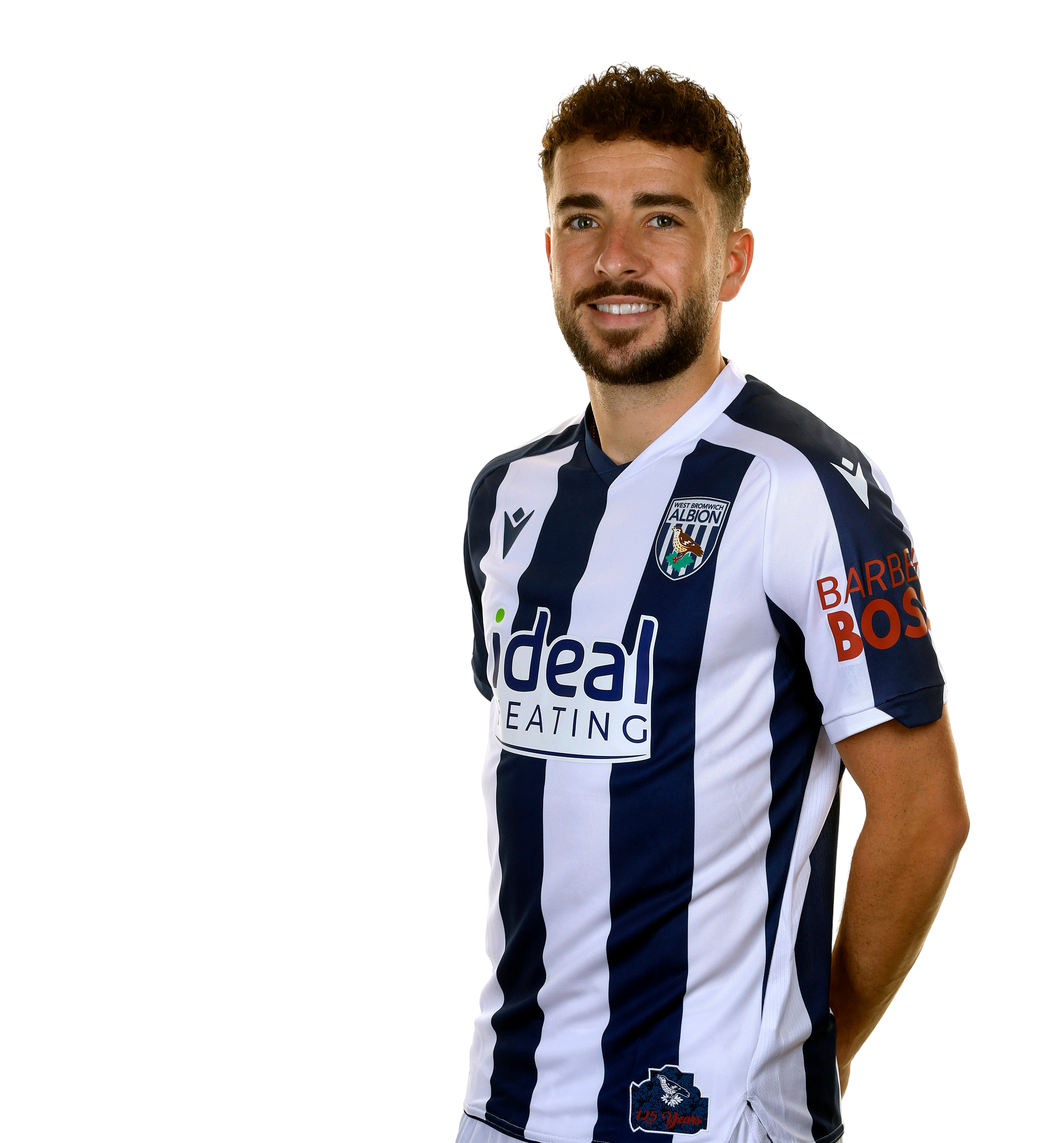 A photo of Albion attacker Mikey Johnston in the 2025/26 home kit