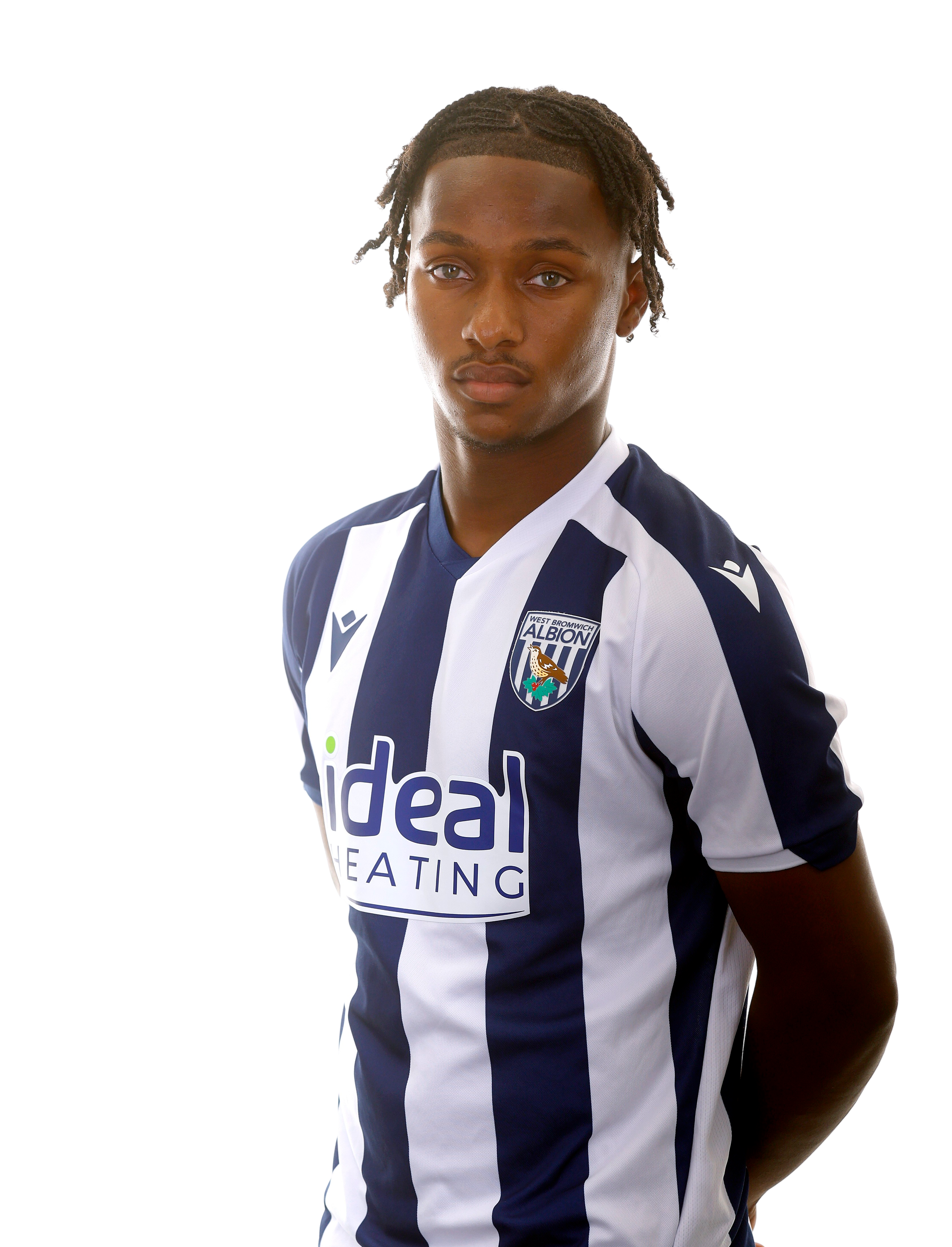 A photo of Albion U18 attacker Remar McNeil in the 2025/26 home kit