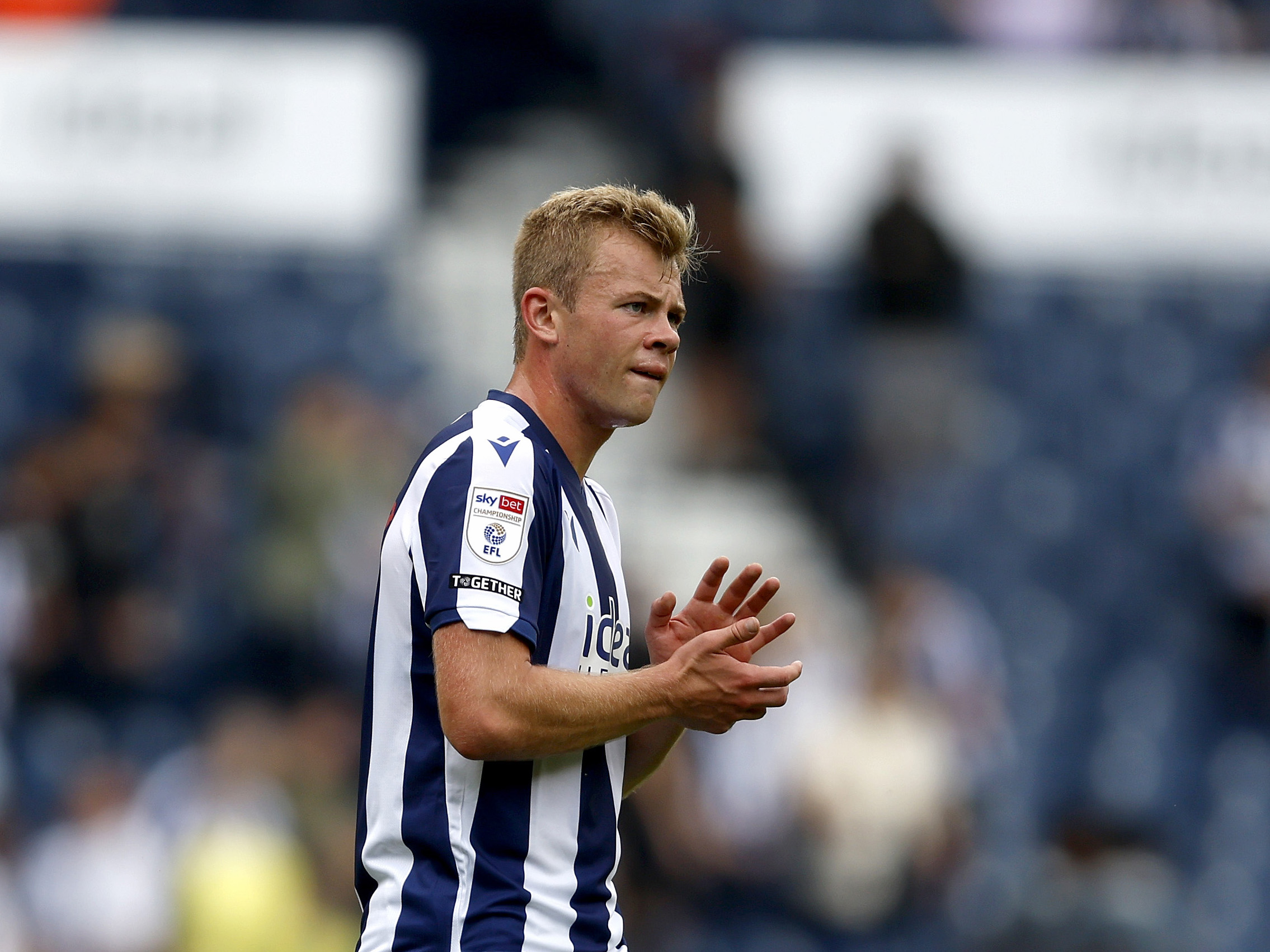 Aune Heggebø applauding WBA fans after the Blackburn game 