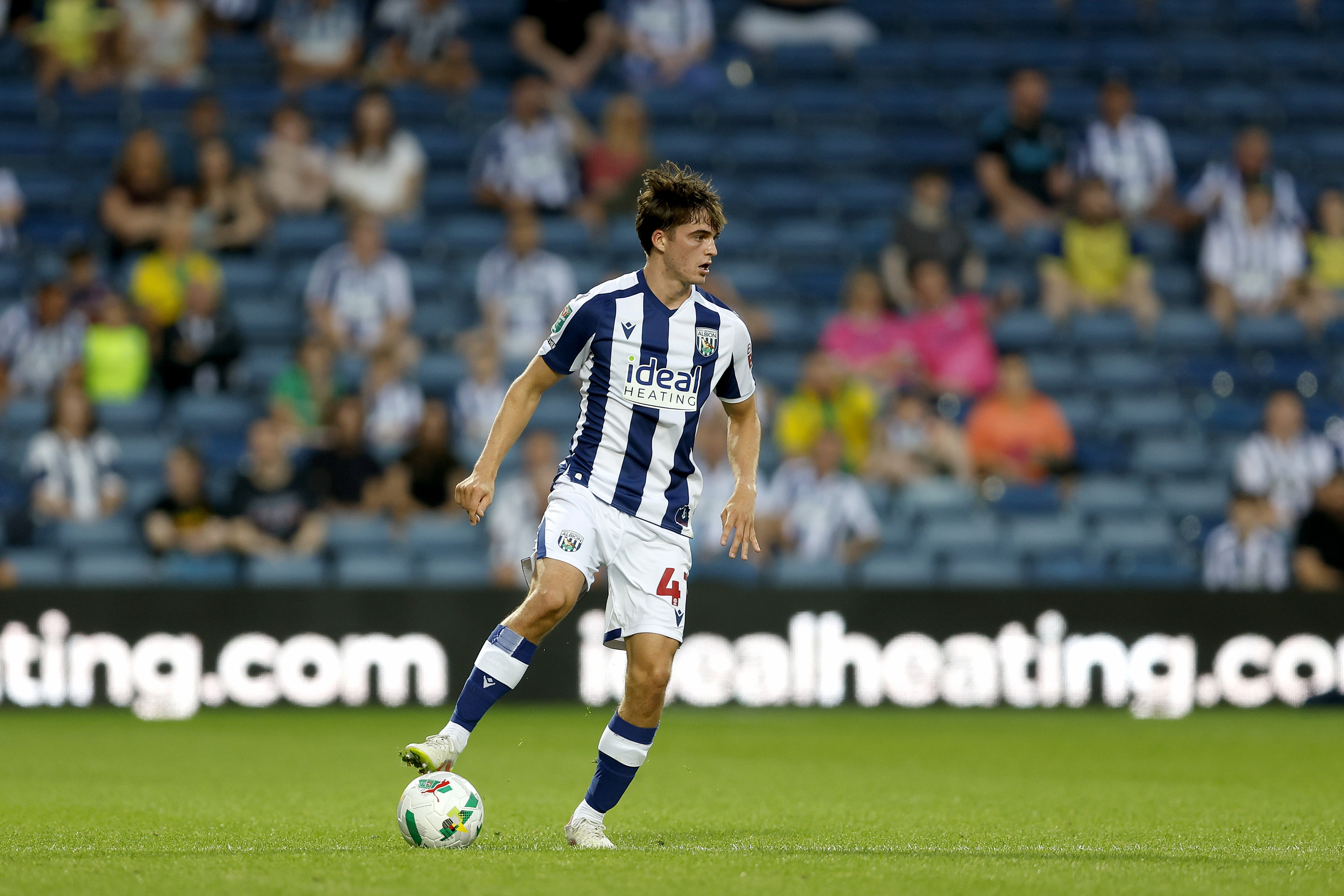 Alex Williams on the ball during the game against Derby County in the home kit 