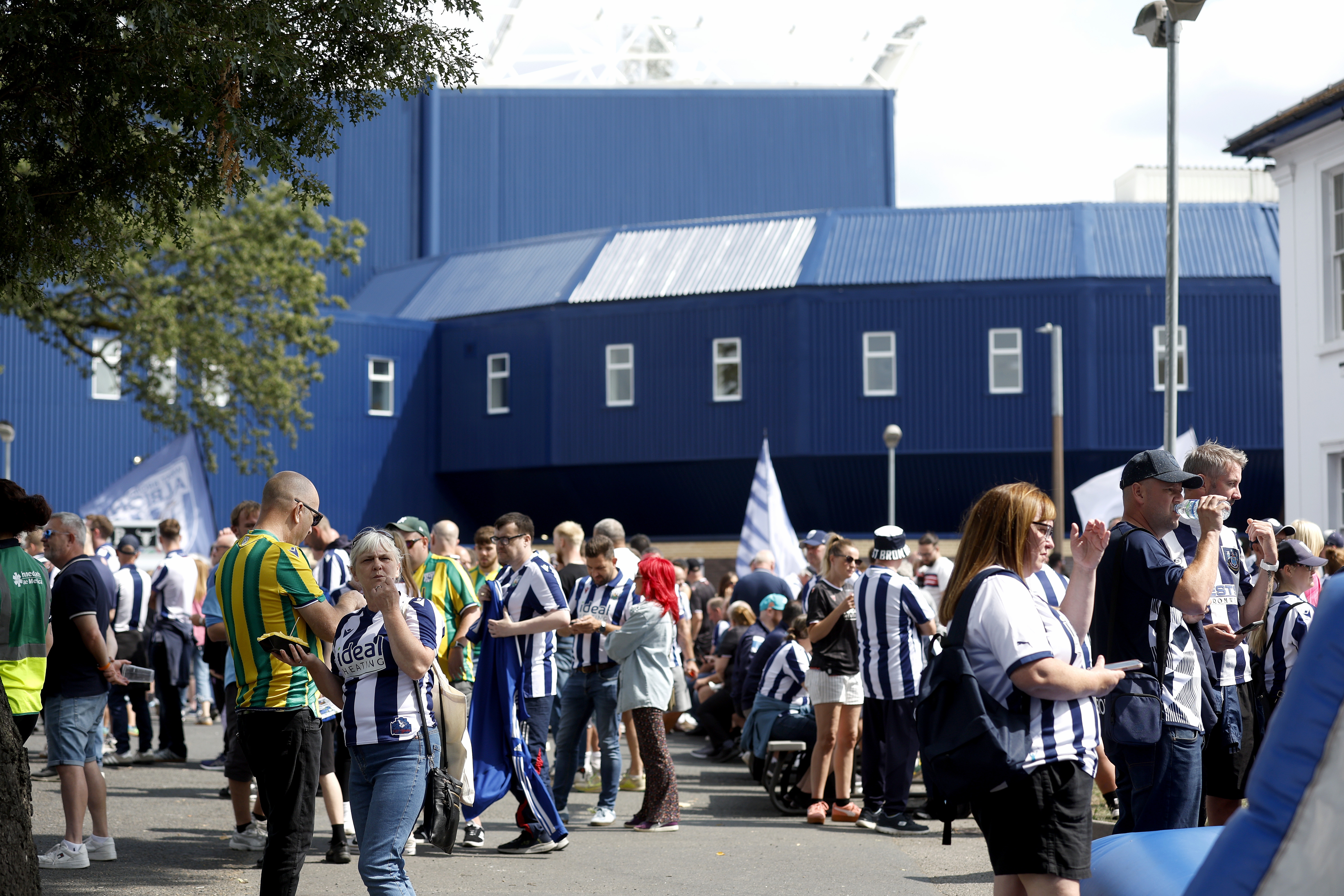 A general view of plenty of Albion fans in the Fan Zone