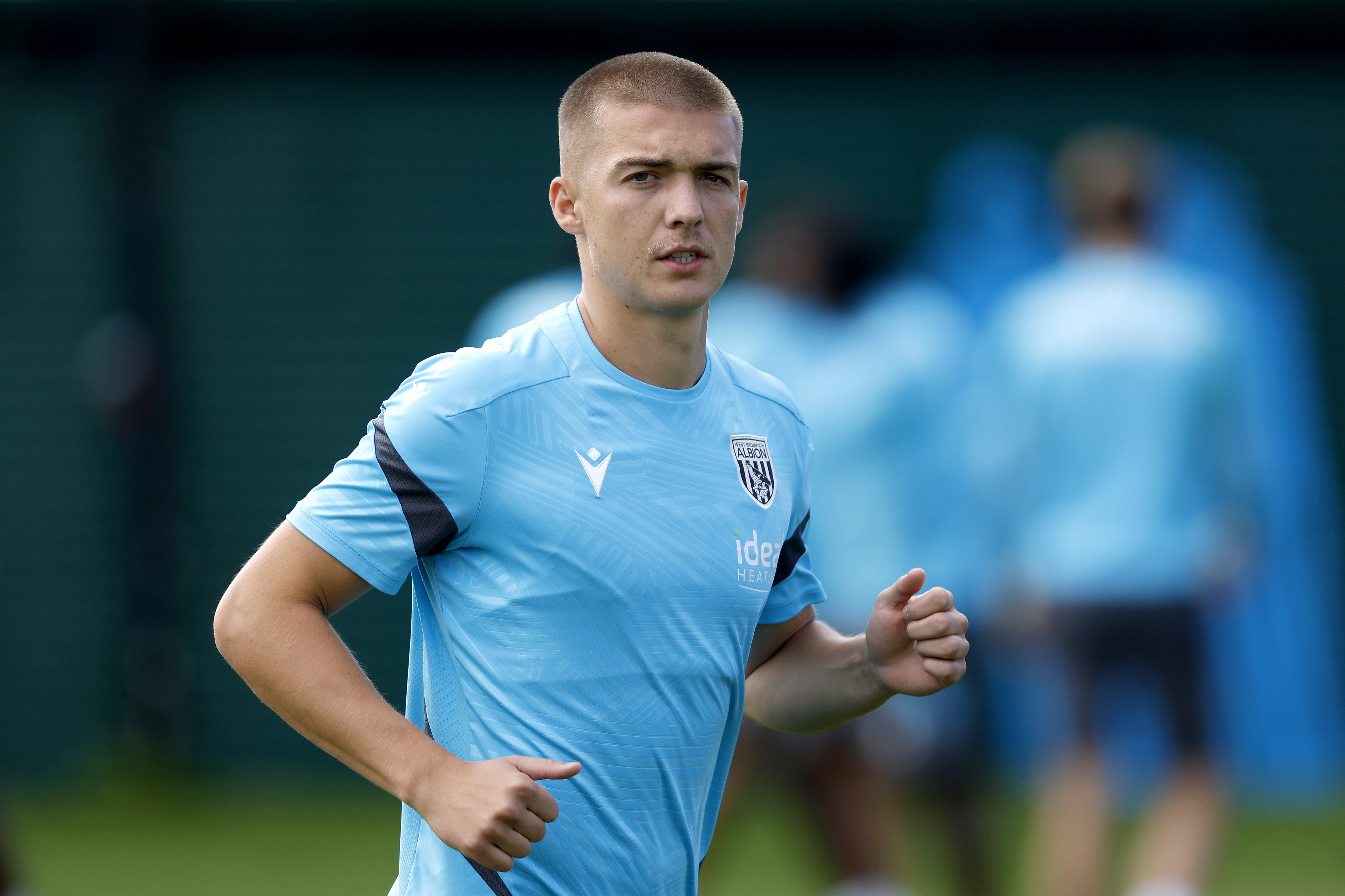 Alfie Gilchrist running in training