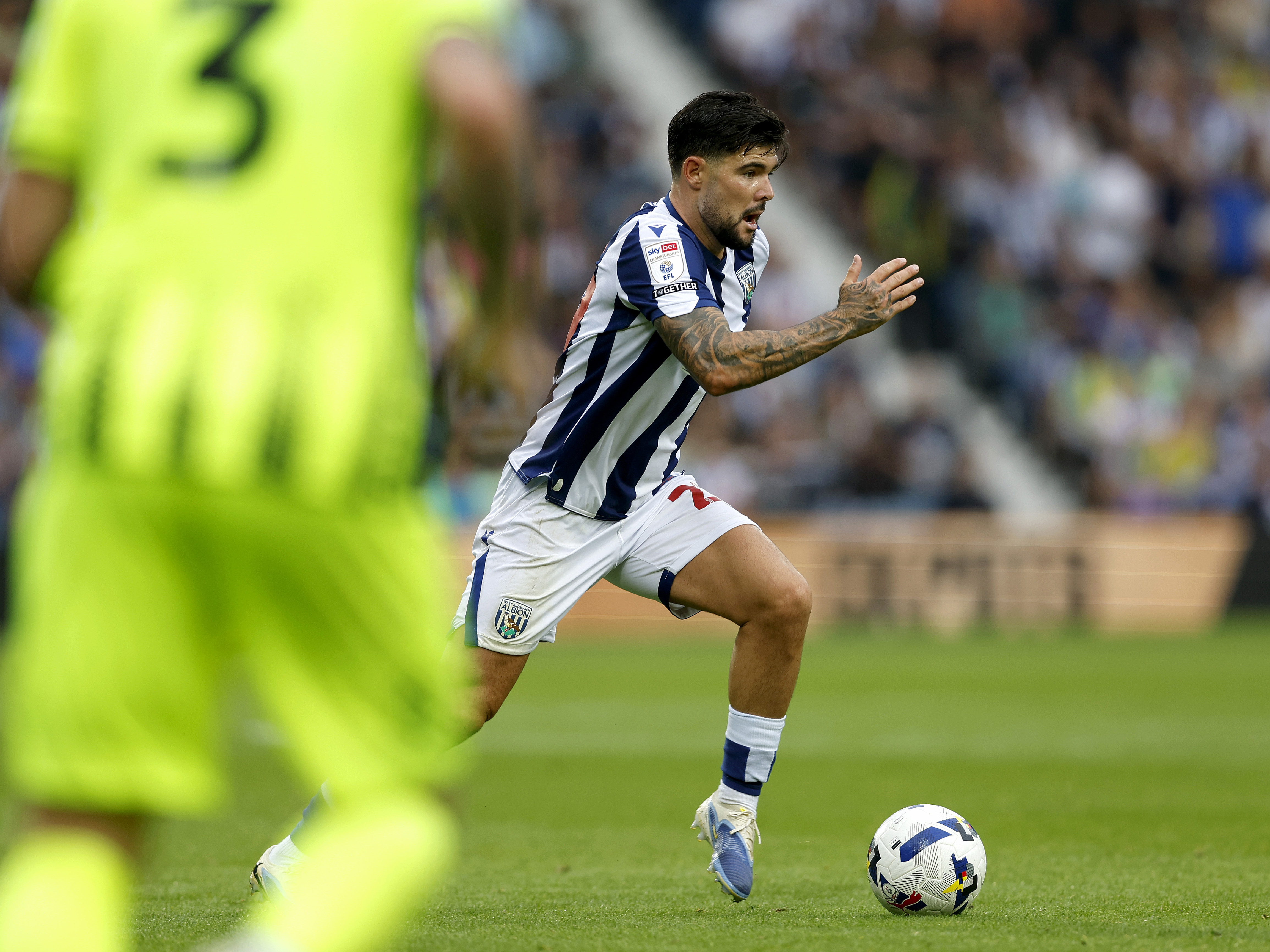 An image of Alex Mowatt on the ball against Portsmouth