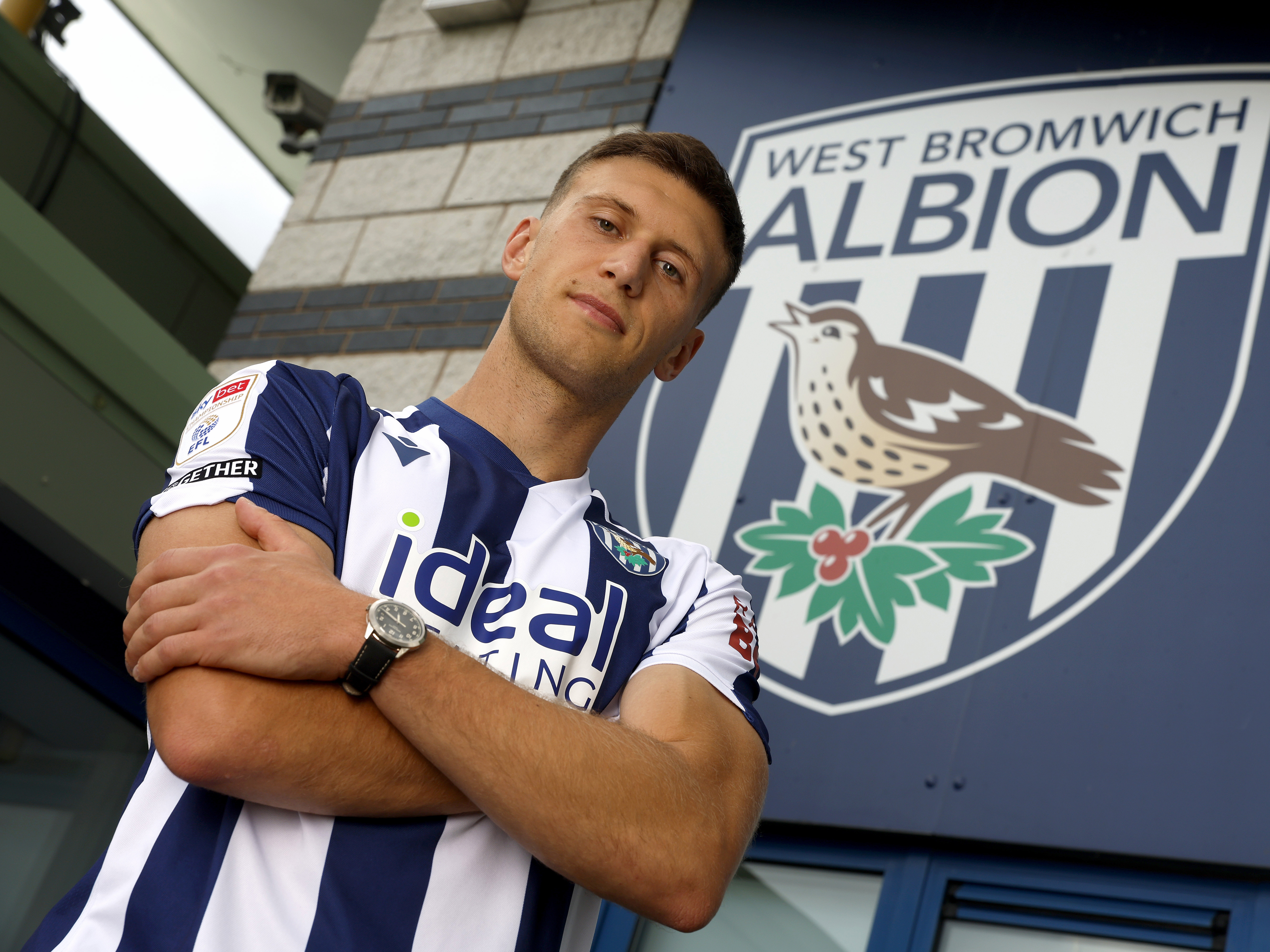A photo of new Albion signing Krystian Bielik in the 2025/26 home kit