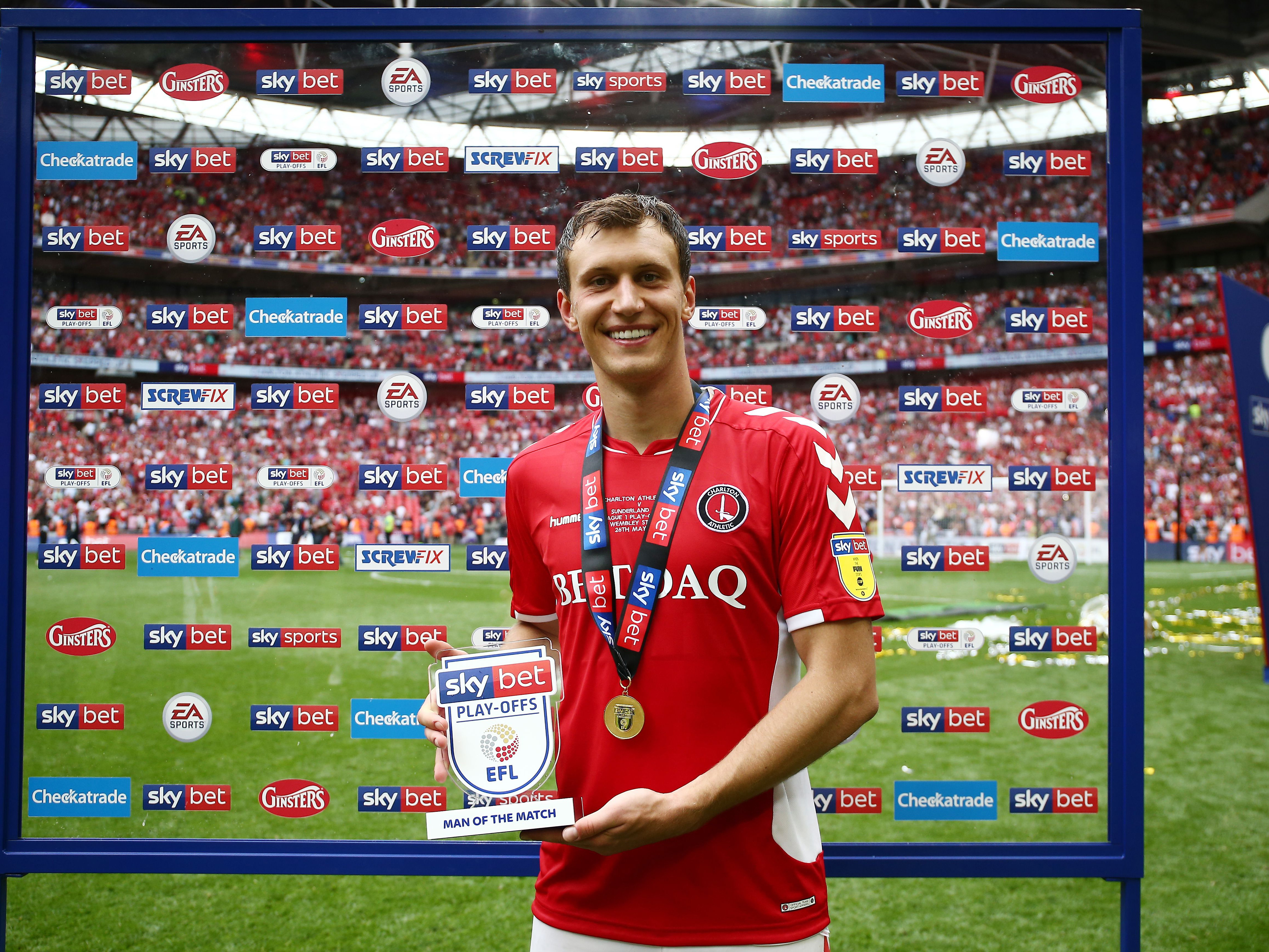 A photo of Krystian Bielik with the man of the match award for former club Charlton