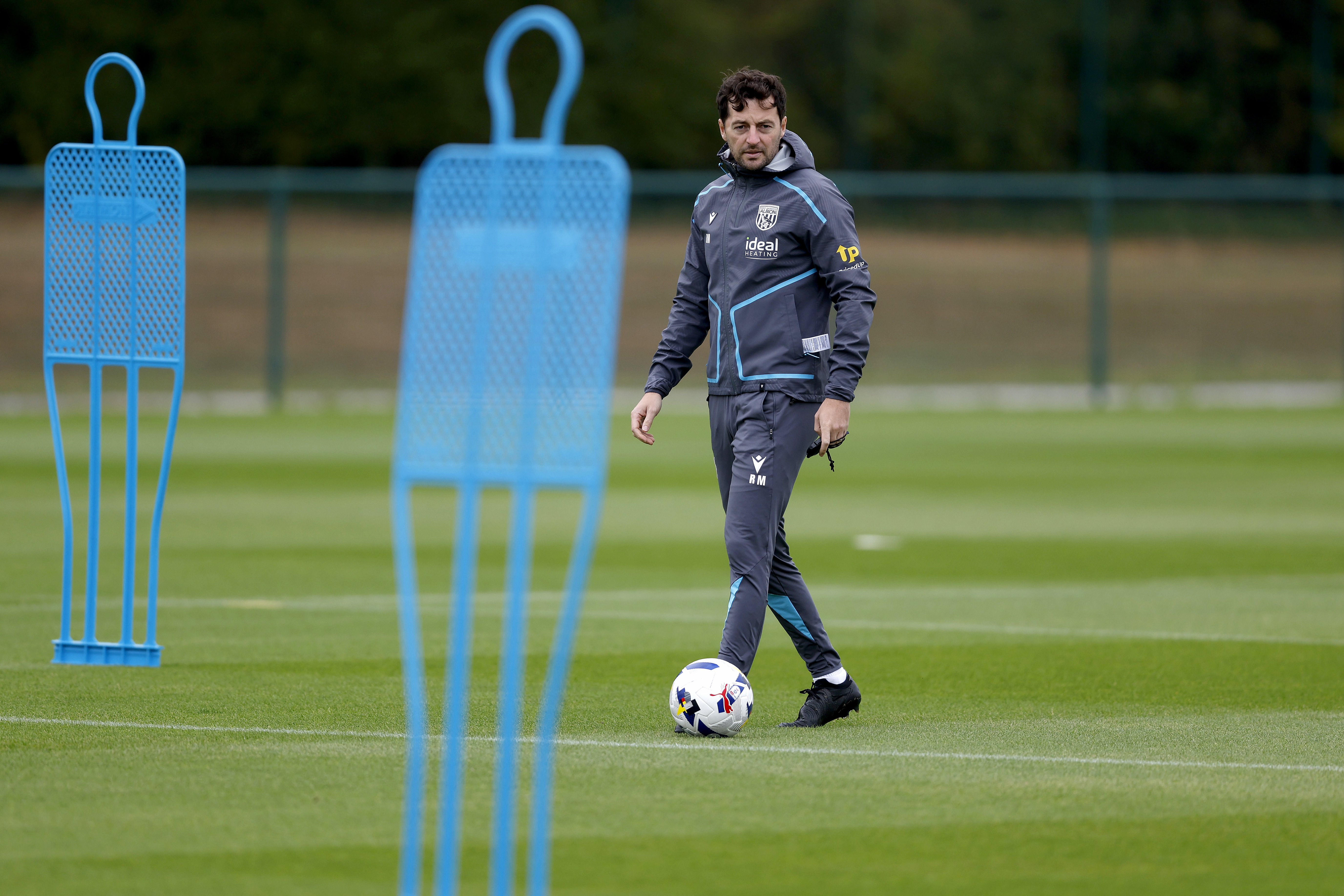 Ryan Mason with a ball at his feet during a training session 