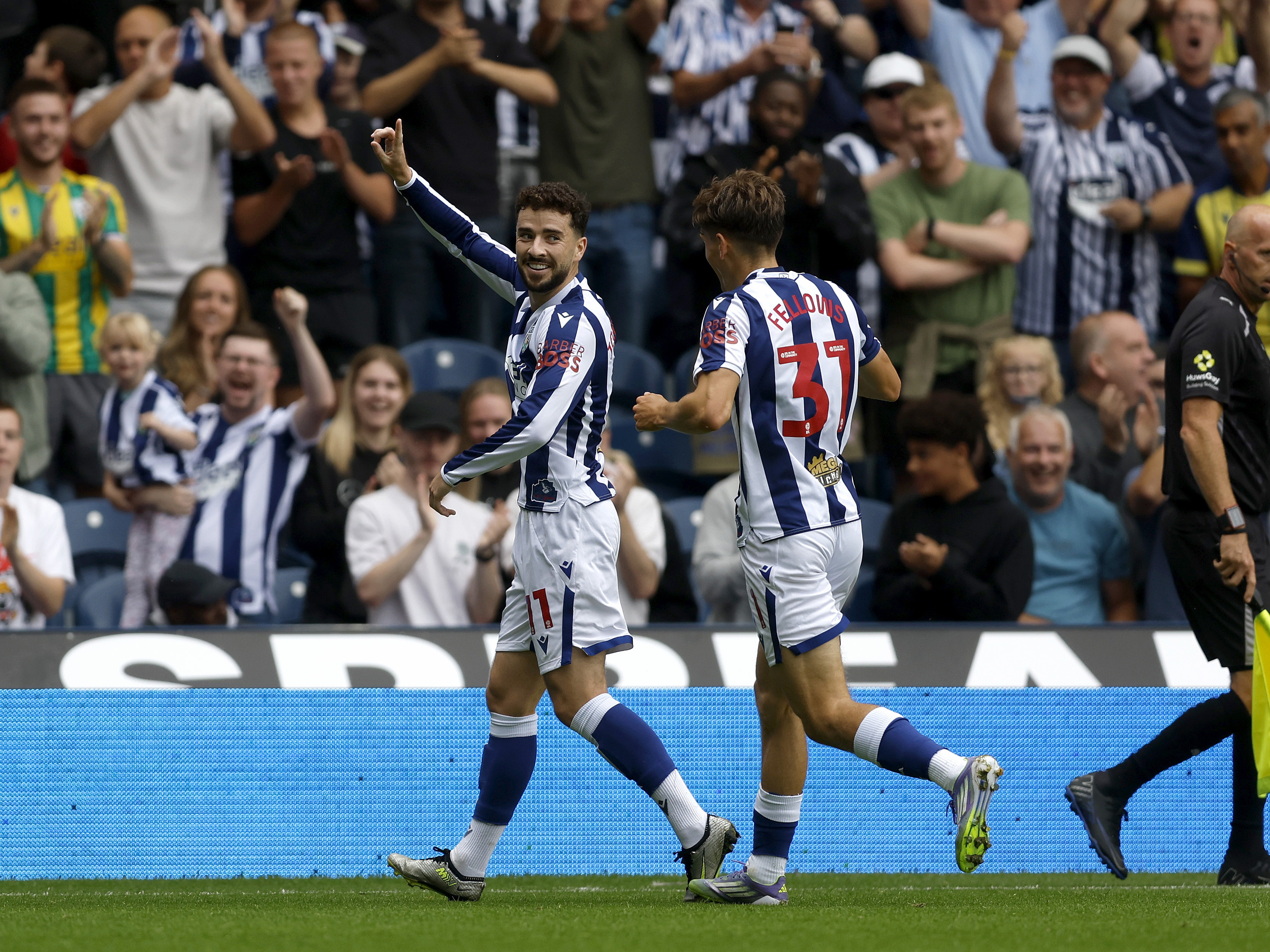 An image of Mikey Johnston celebrating his goal against Portsmouth