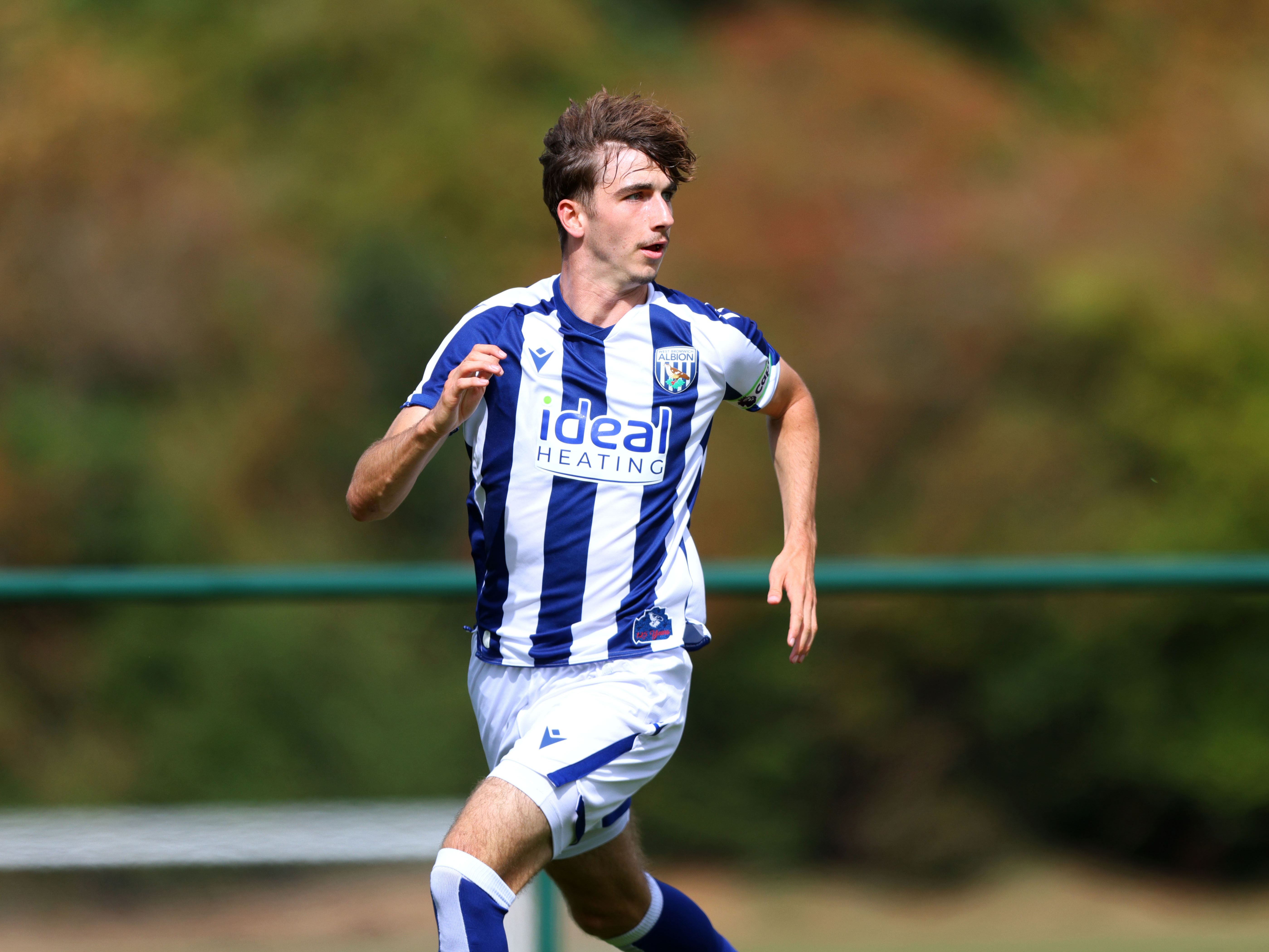 A photo of Albion U18 defender Alfie Maughan in the 2025/26 home kit