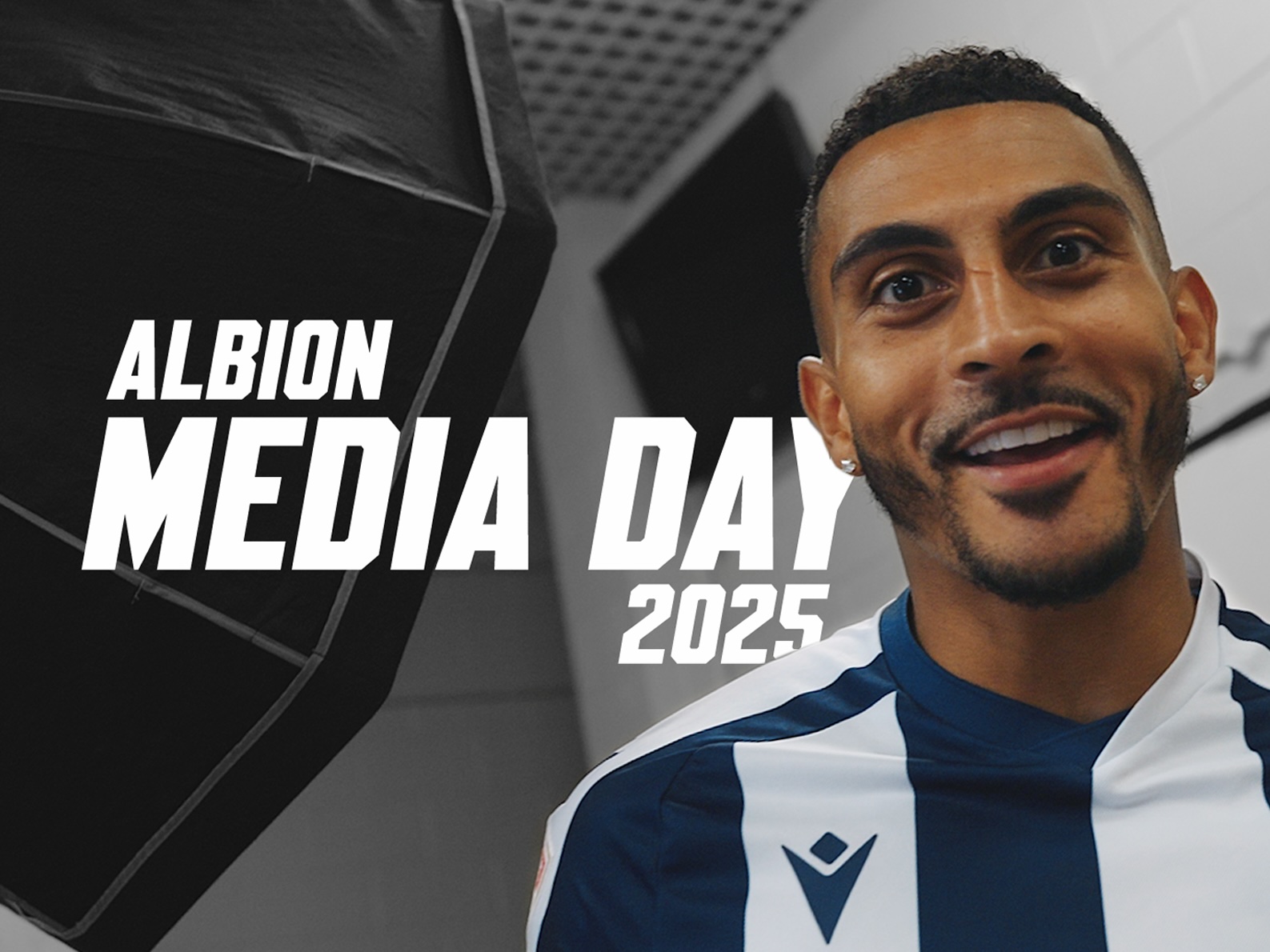 Albion's Media Day 2025 written on a photo of Karlan Grant pulling a face to the camera while stood in a home shirt 
