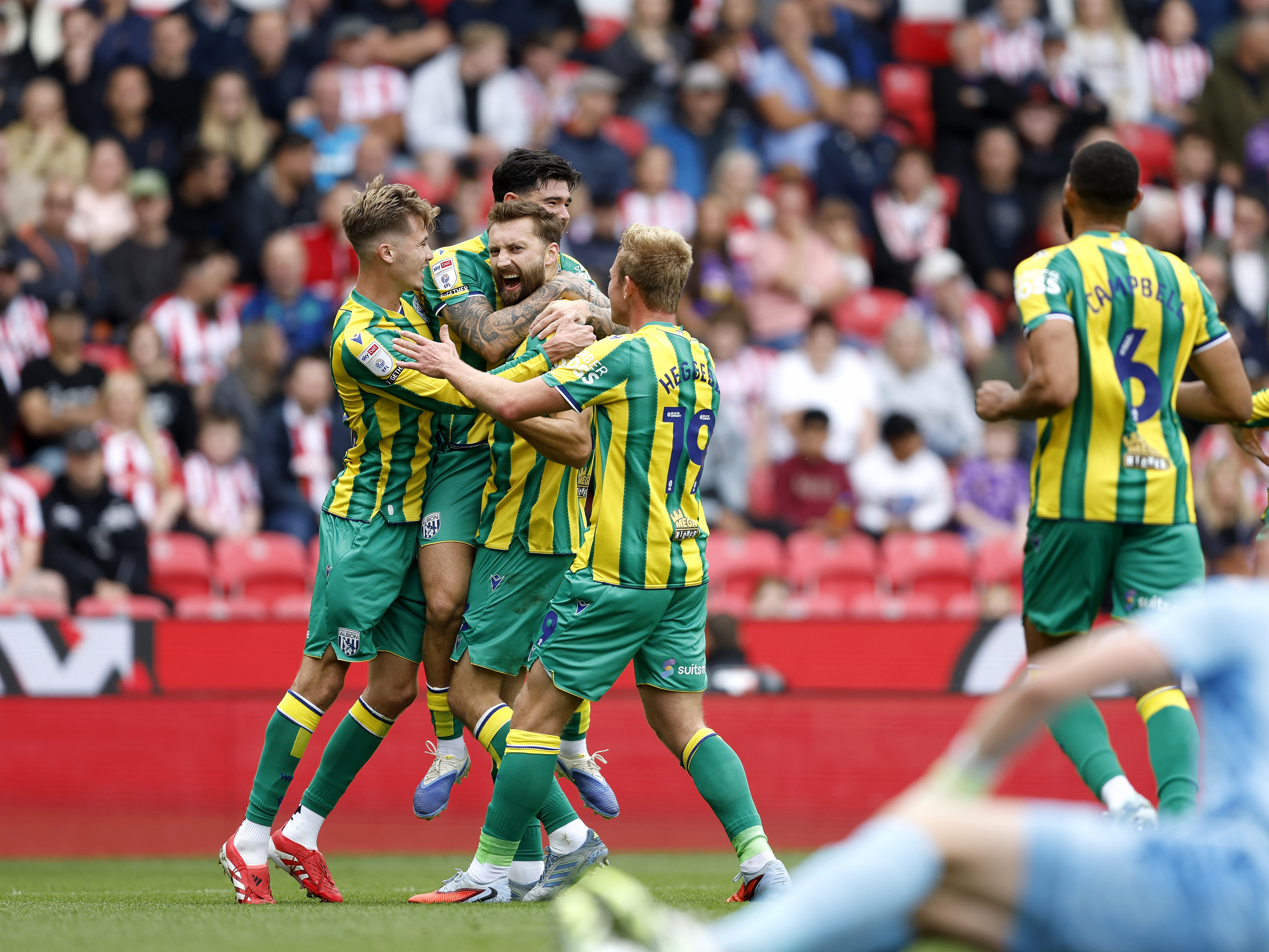 An image of Nat Phillips celebrating his goal at Stoke