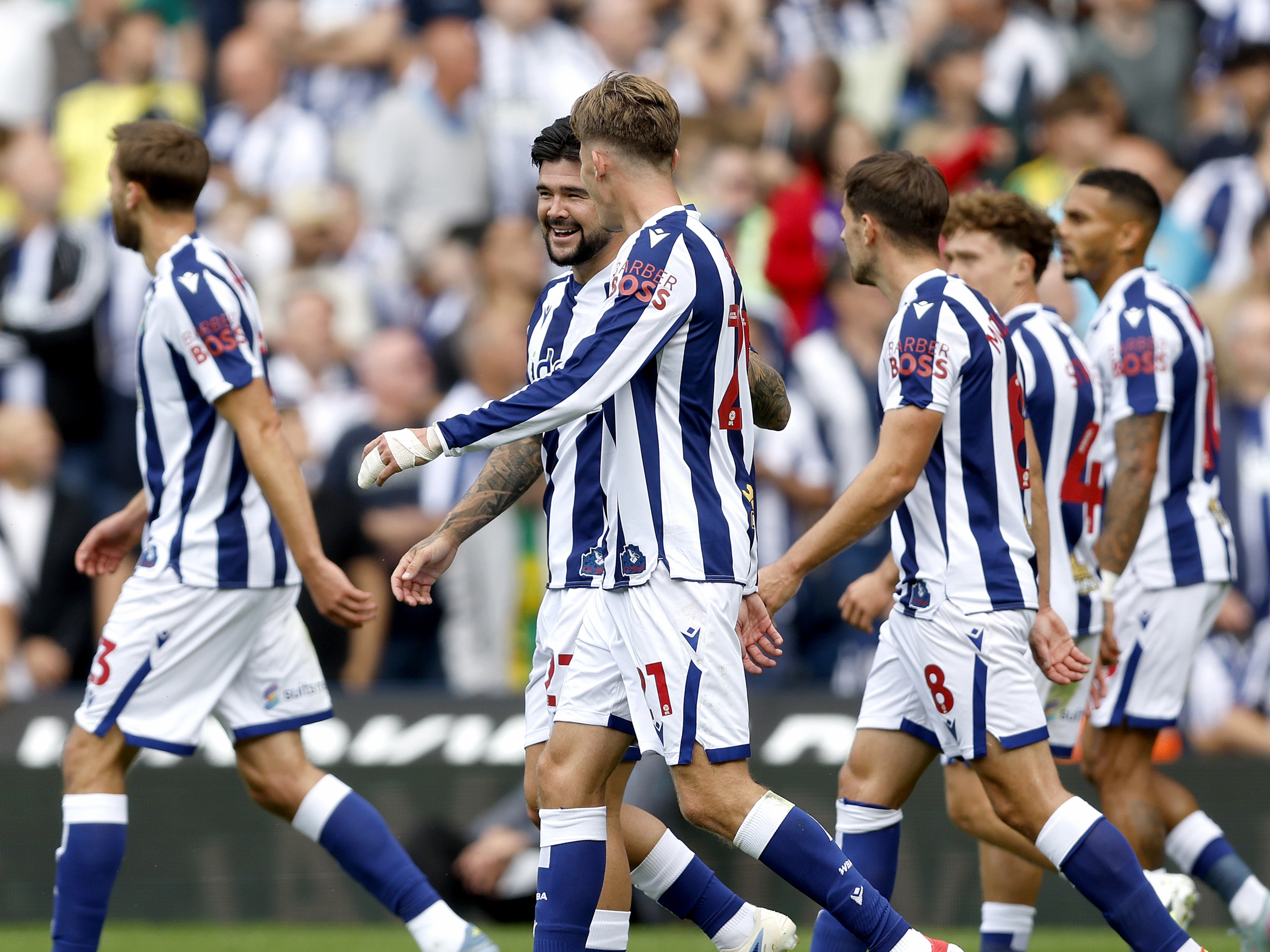 An image of Isaac Price and Alex Mowatt talking after Albion's goal against Blackburn