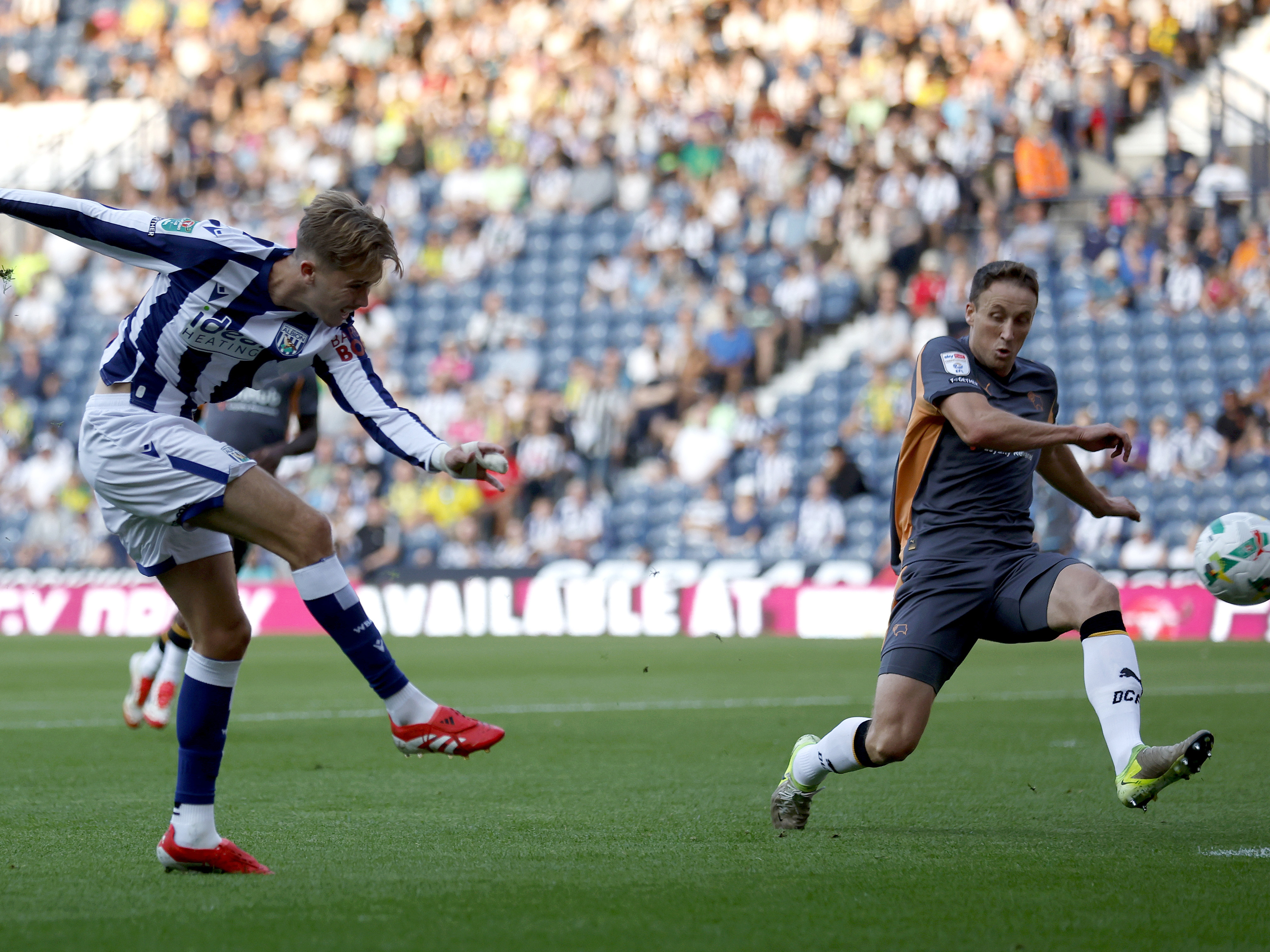 An image of Isaac Price shooting against Derby