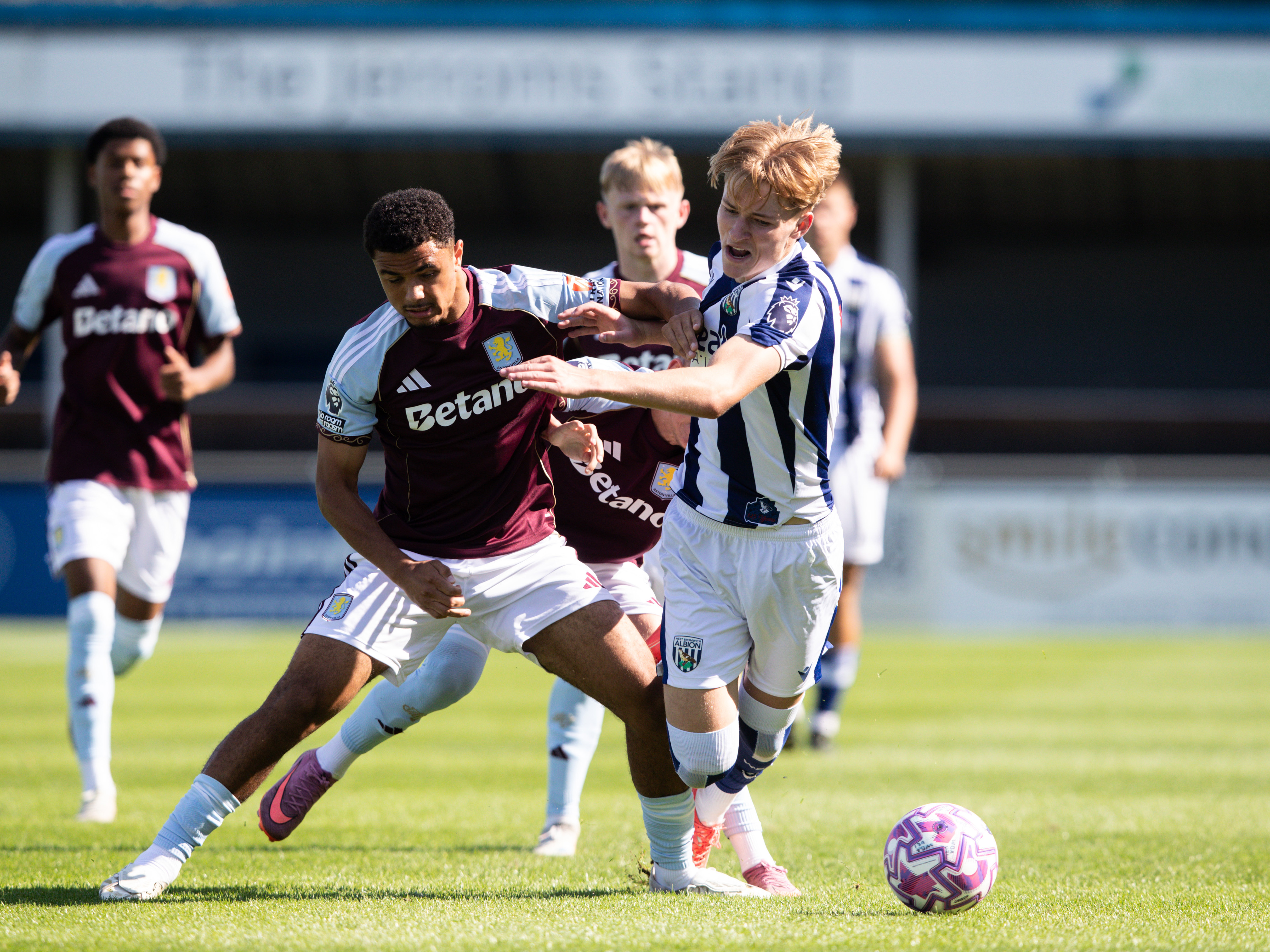 A photo of Albion U21 winger Ollie Bostock in the 2025/26 home kit