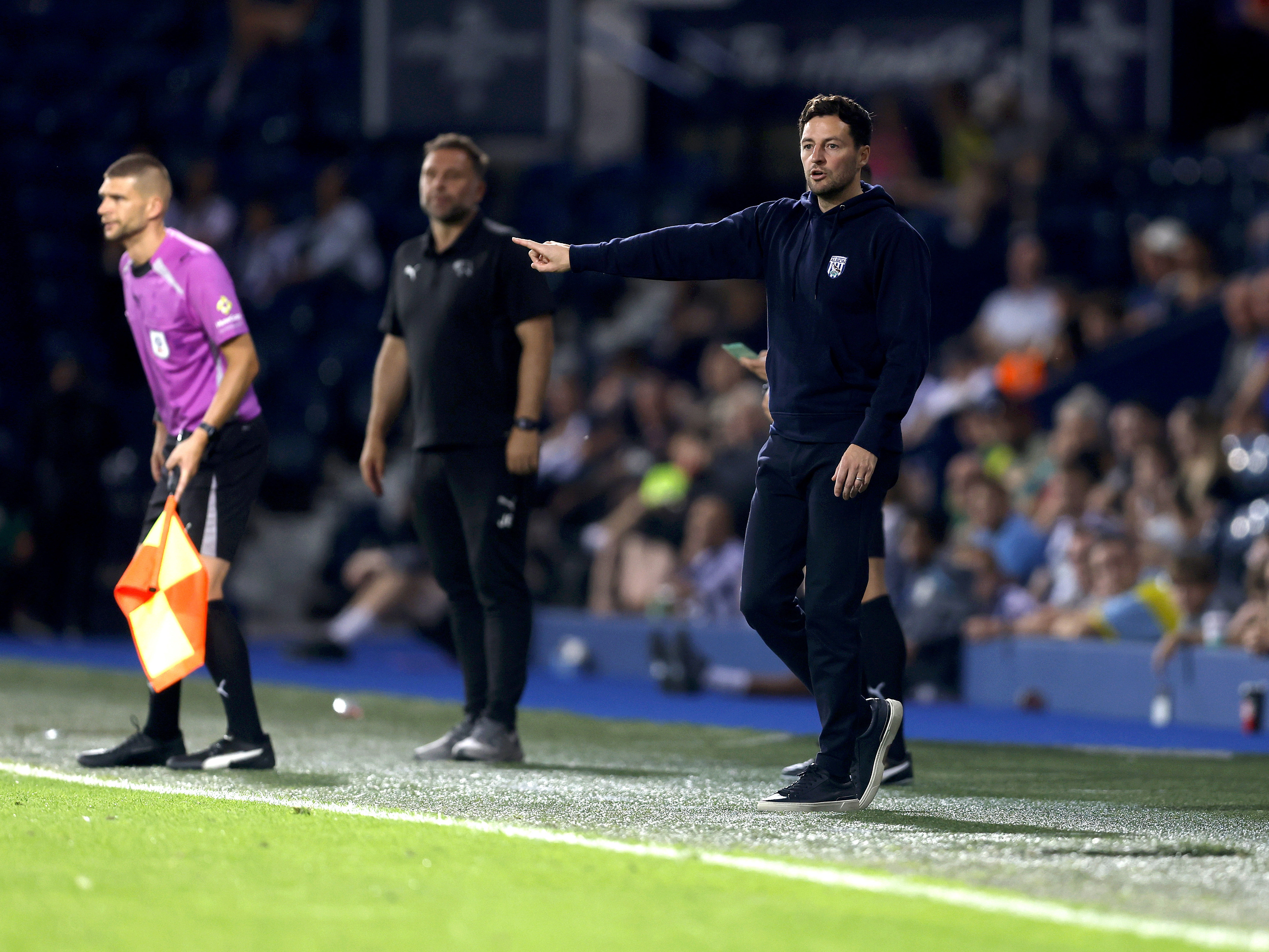An image of Ryan Mason on the touchline