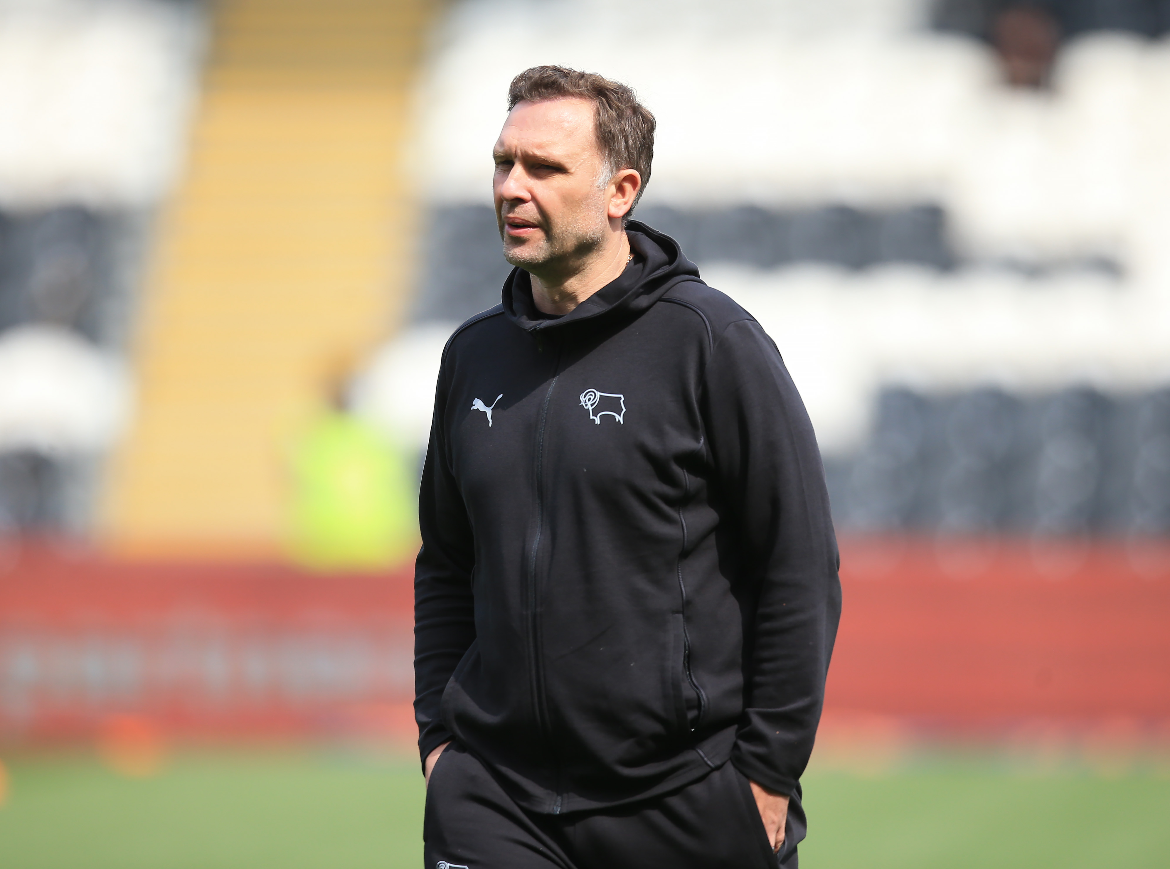 Derby boss John Eustace in a club tracksuit