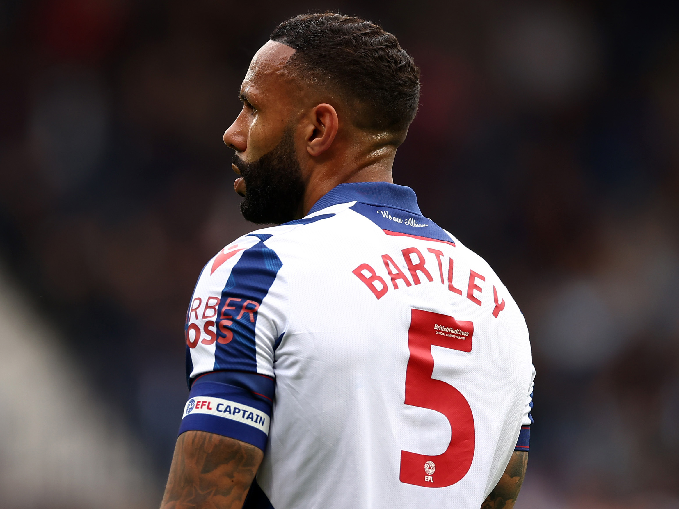 An image of Kyle Bartley with his back to camera during a game showing his name and number 