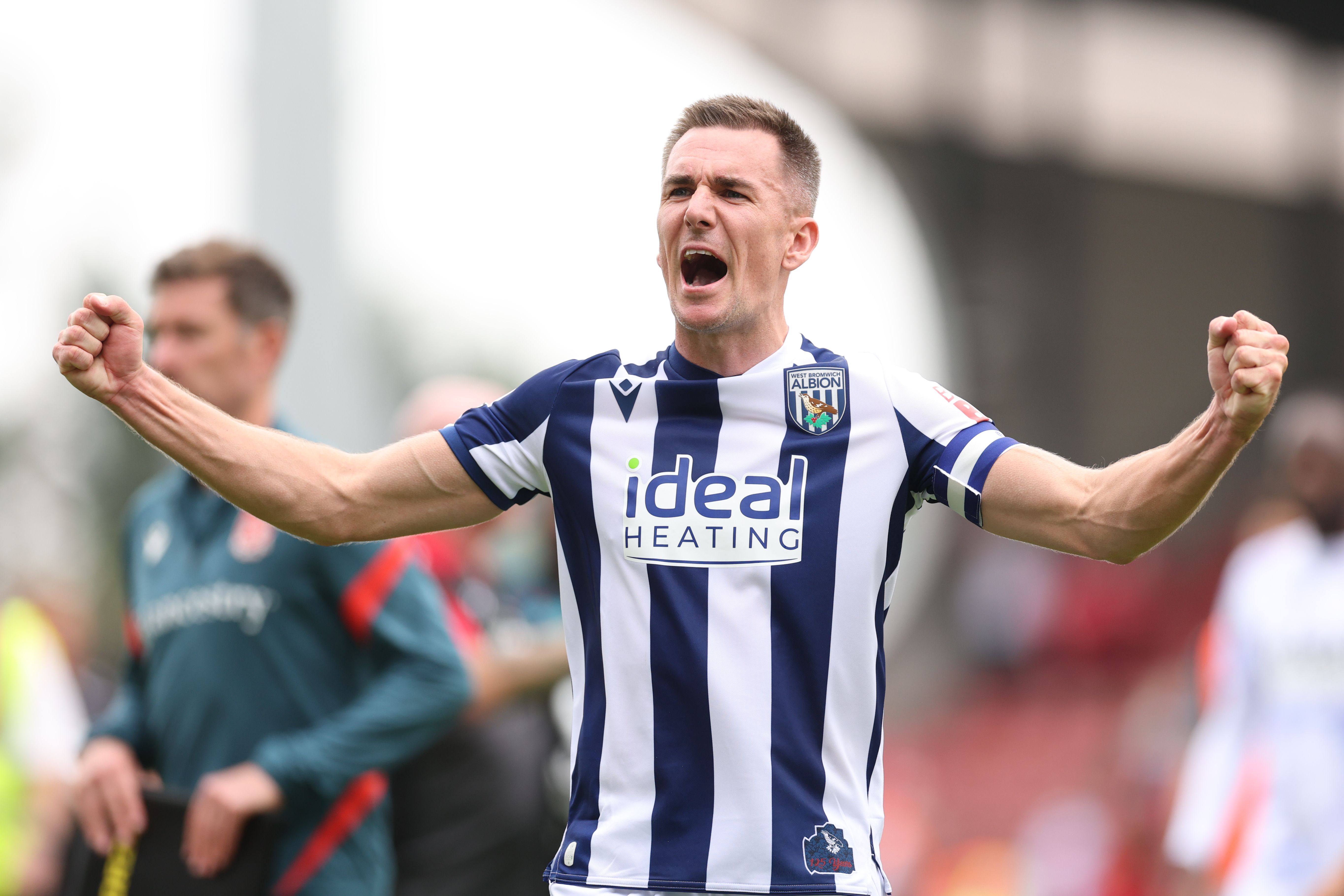 Jed Wallace celebrates at full-time after WBA beat Wrexham