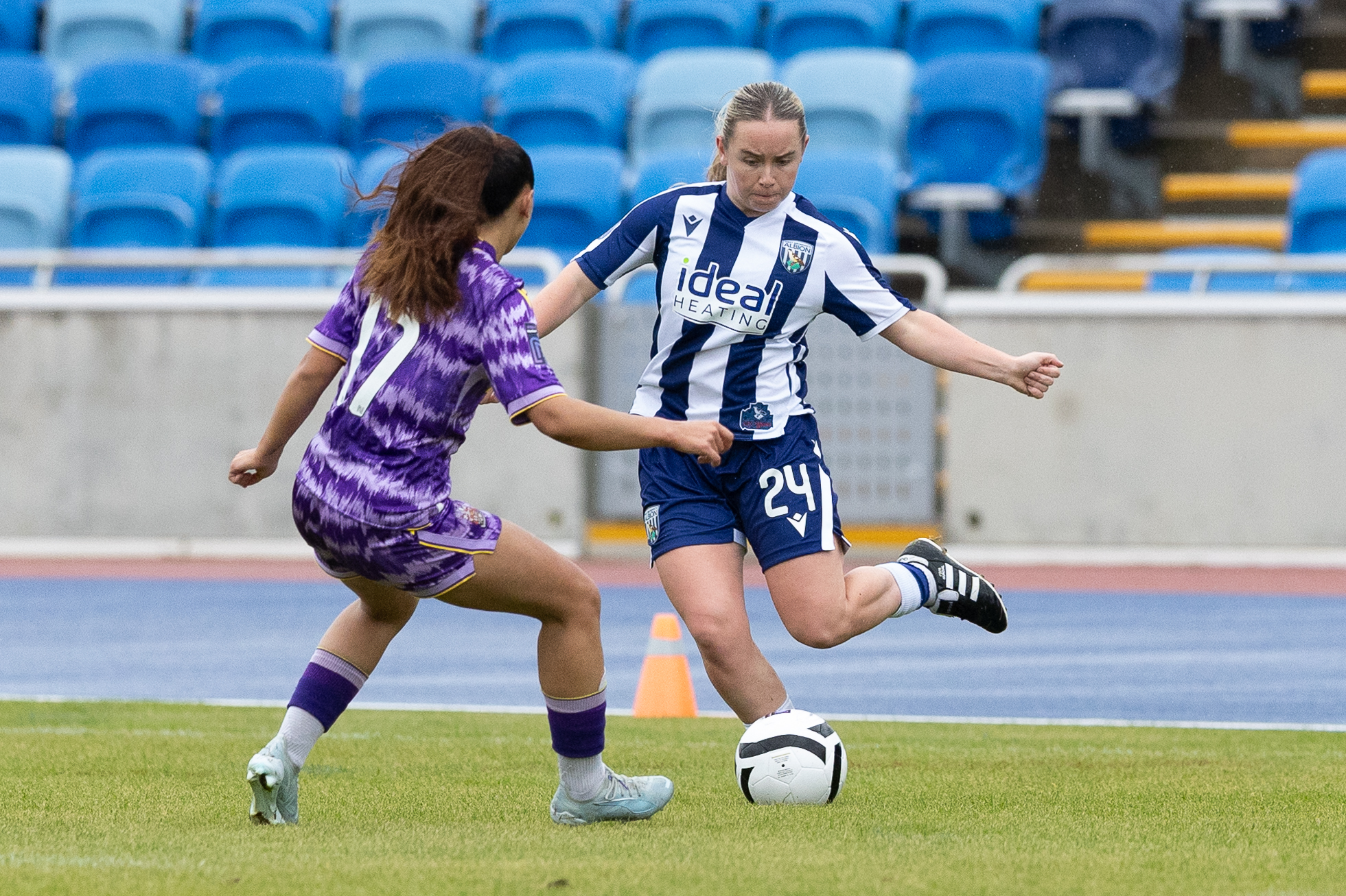 Ella Haughey in action for WBA Women in the home kit 