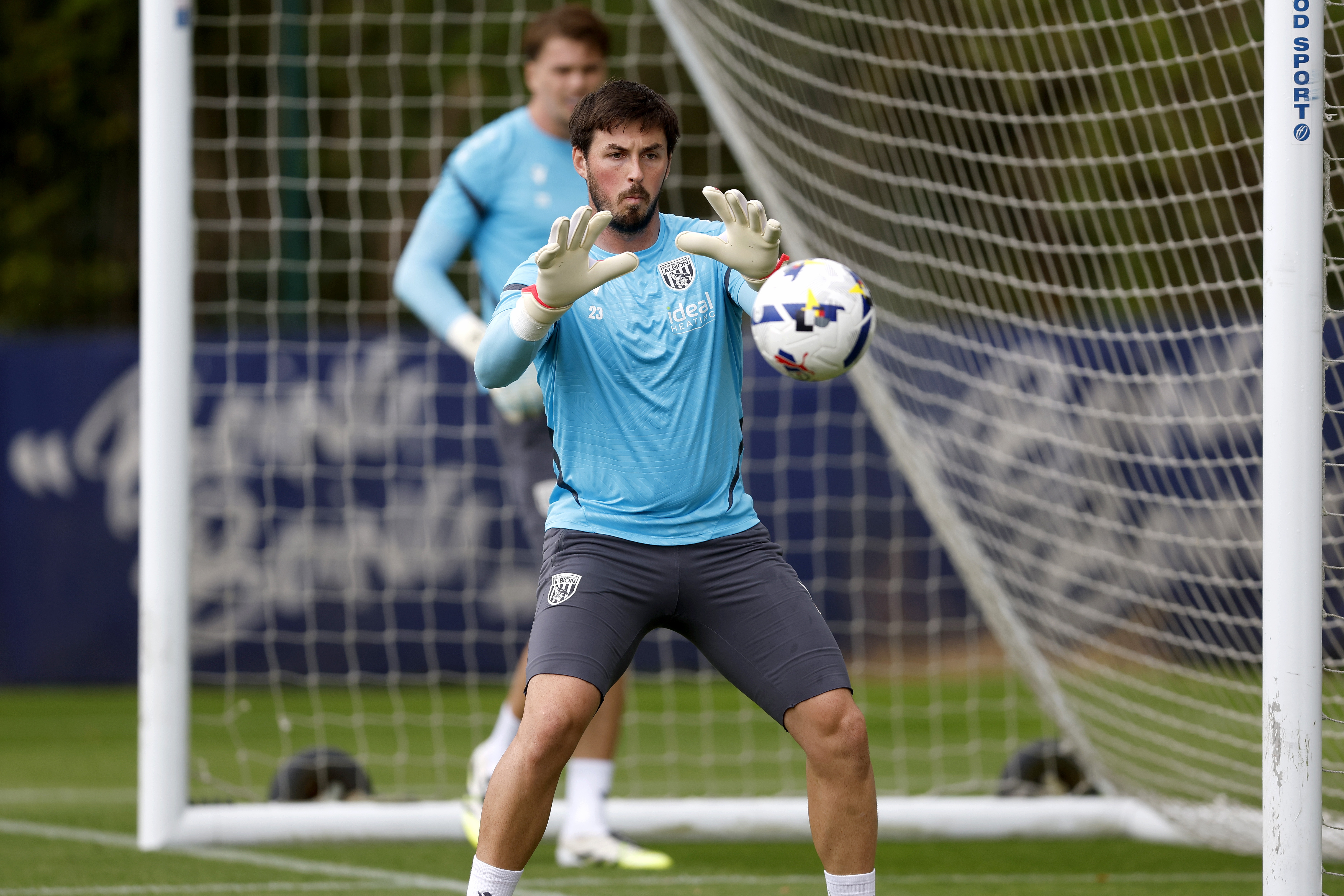Joe Wildsmith catching the ball in training 