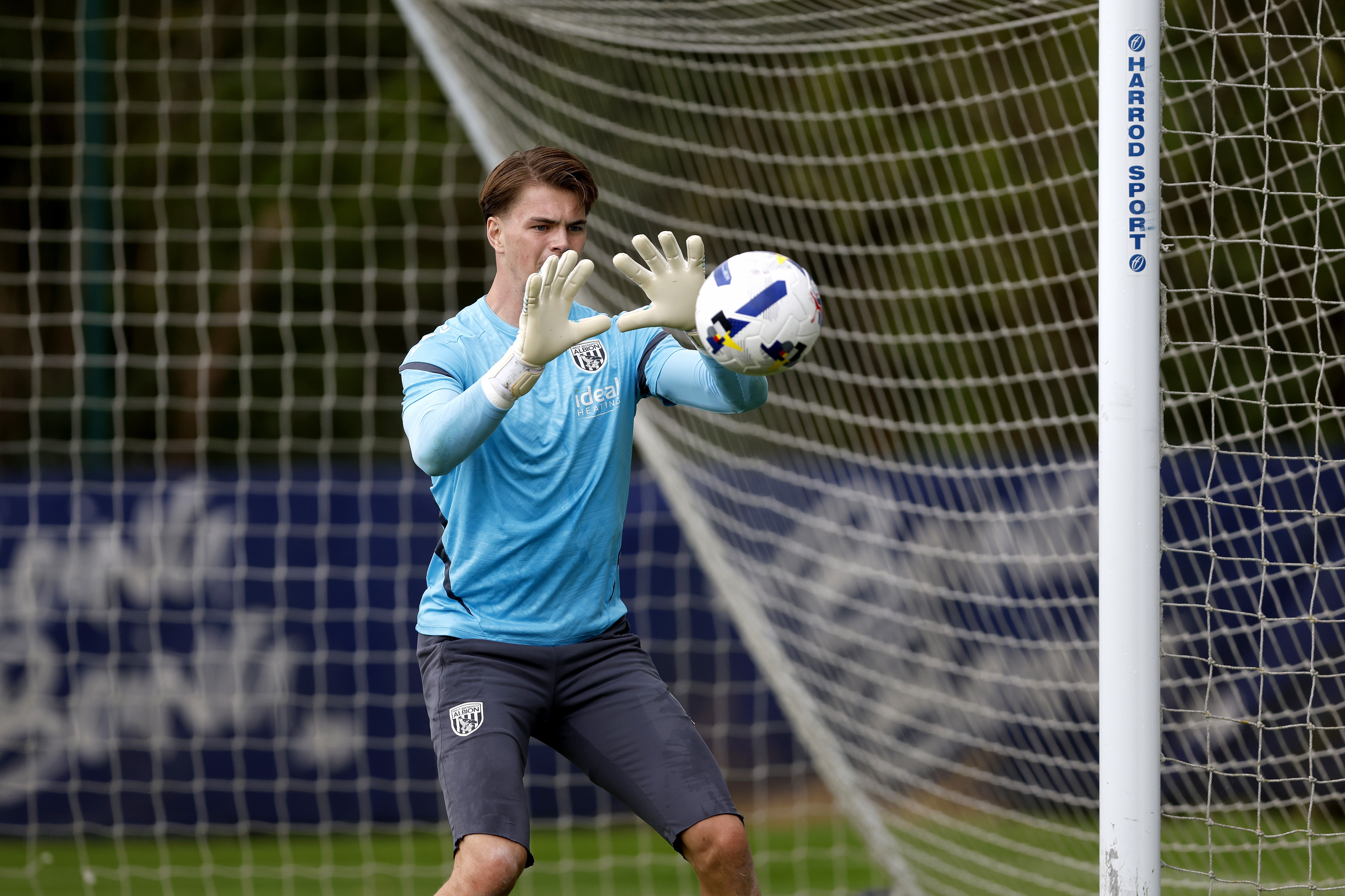Josh Griffiths catching the ball in training 