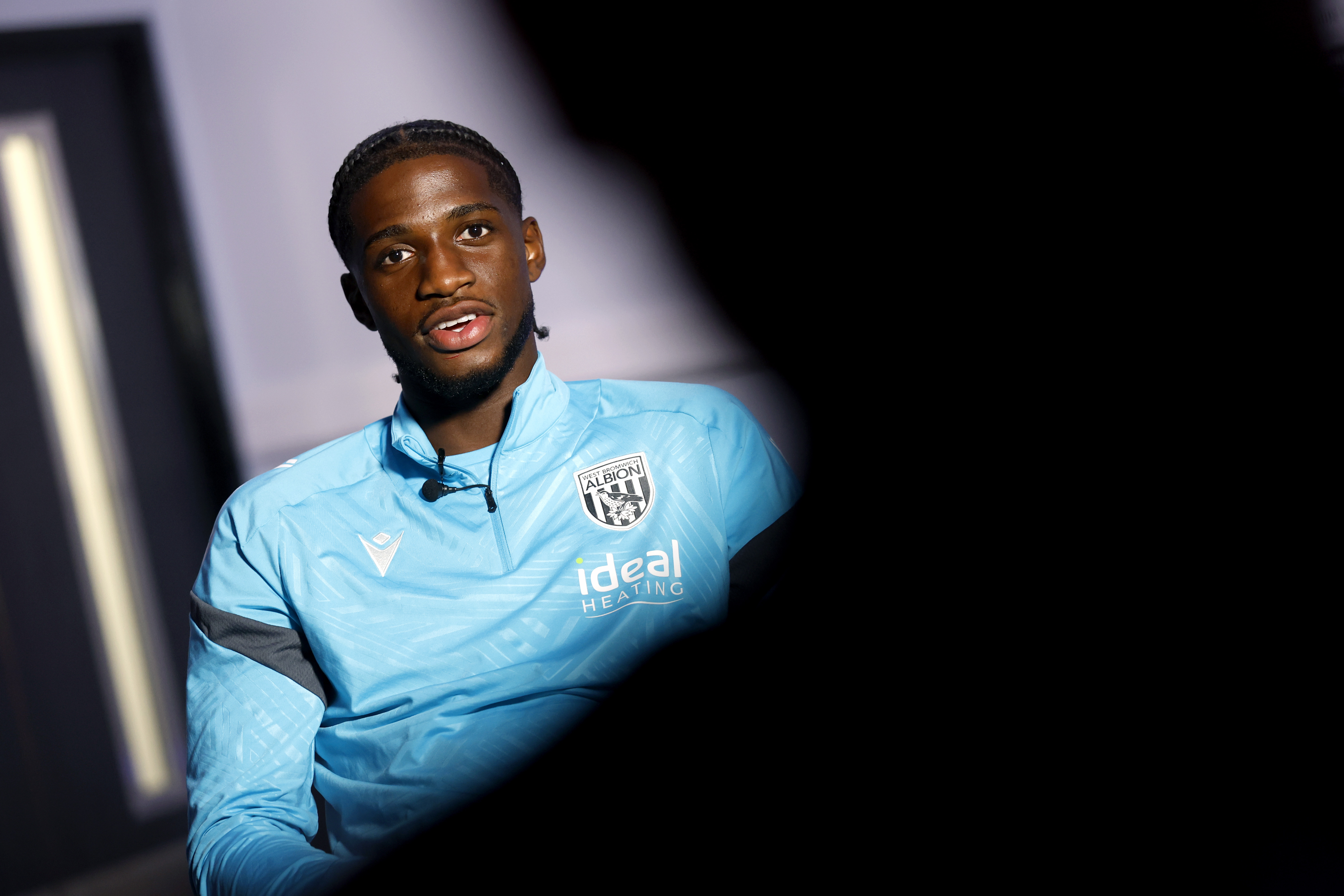 Samuel Iling-Junior smiling while being interviewed by WBA TV