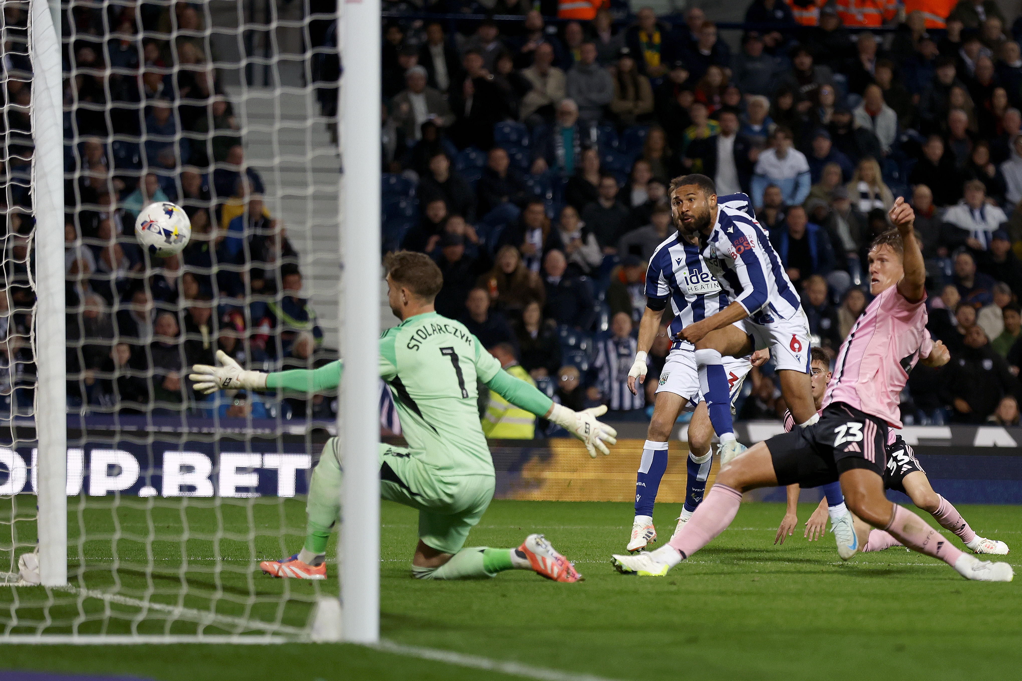 George Campbell taking a shot against Leicester 