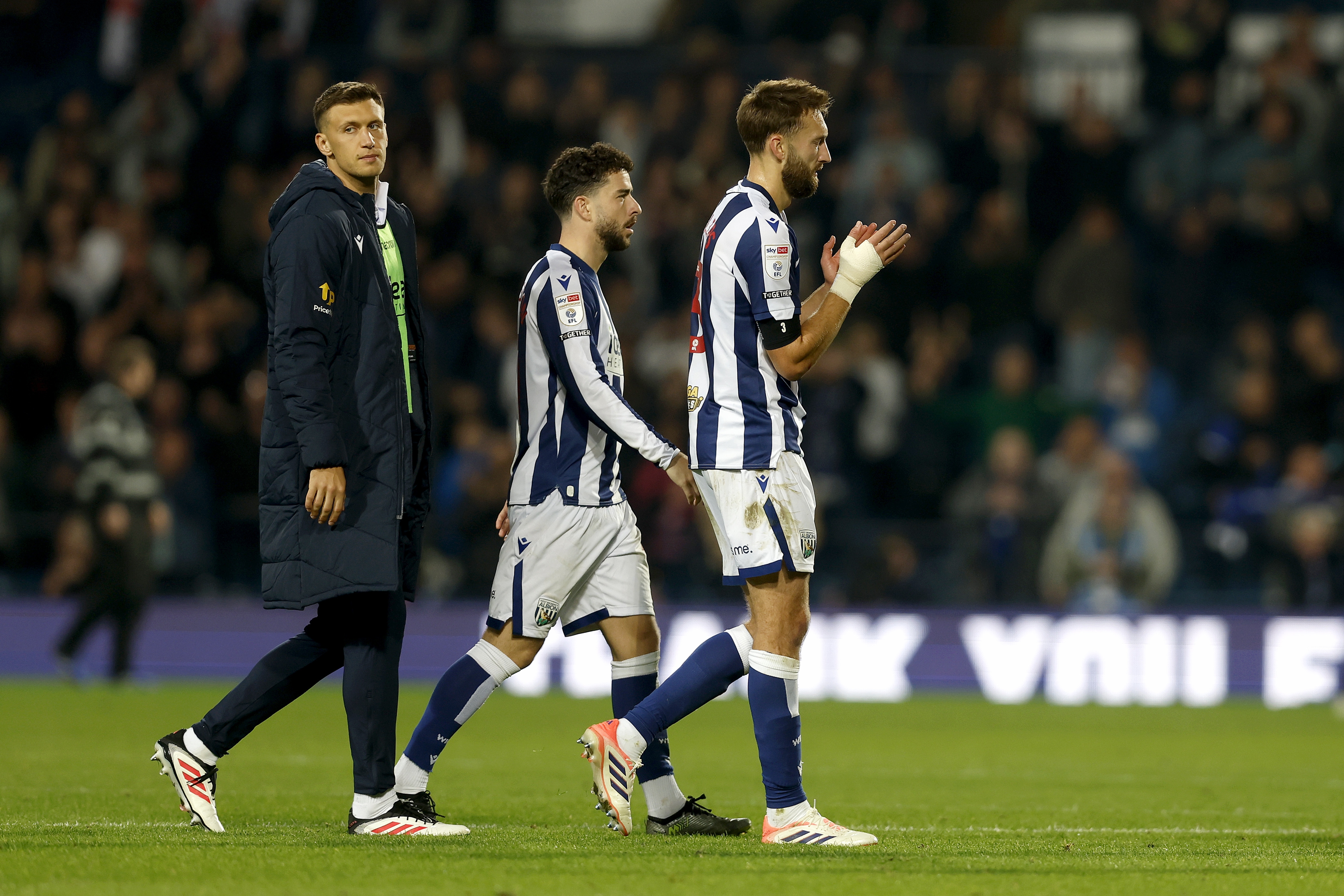 Nat Phillips applauding WBA fans after the game with Leicester 