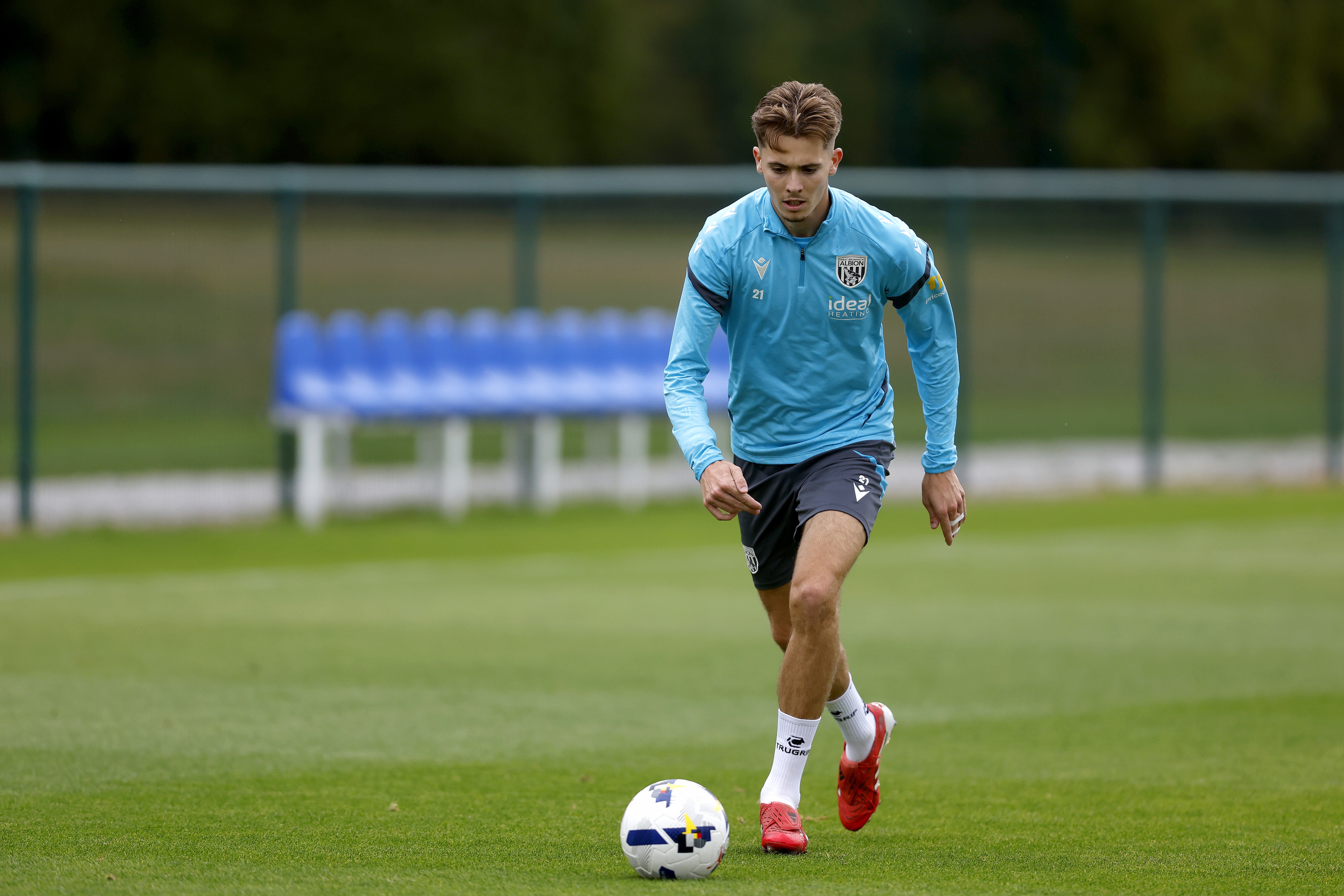Isaac Price on the ball during training