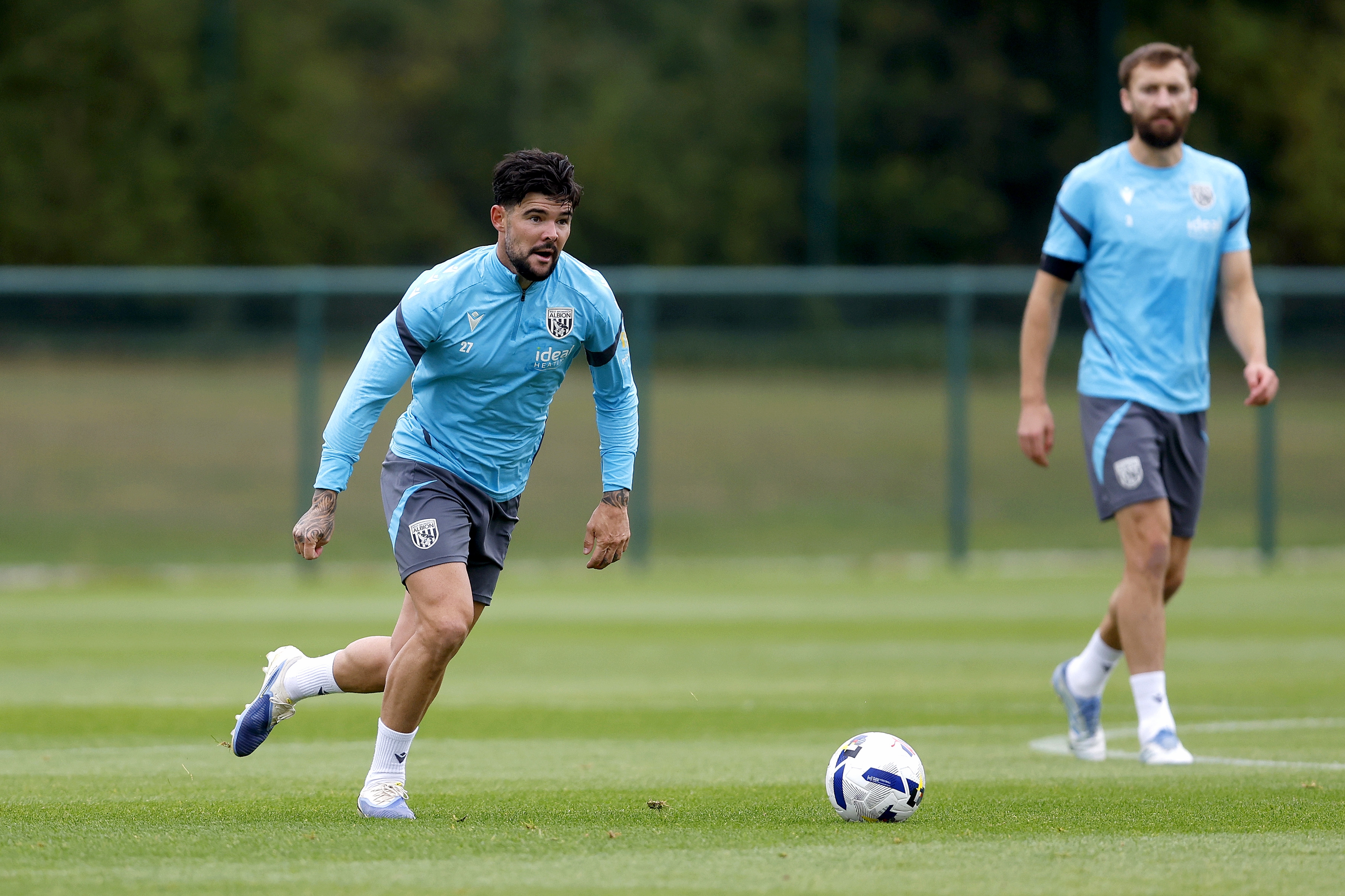Alex Mowatt on the ball during training
