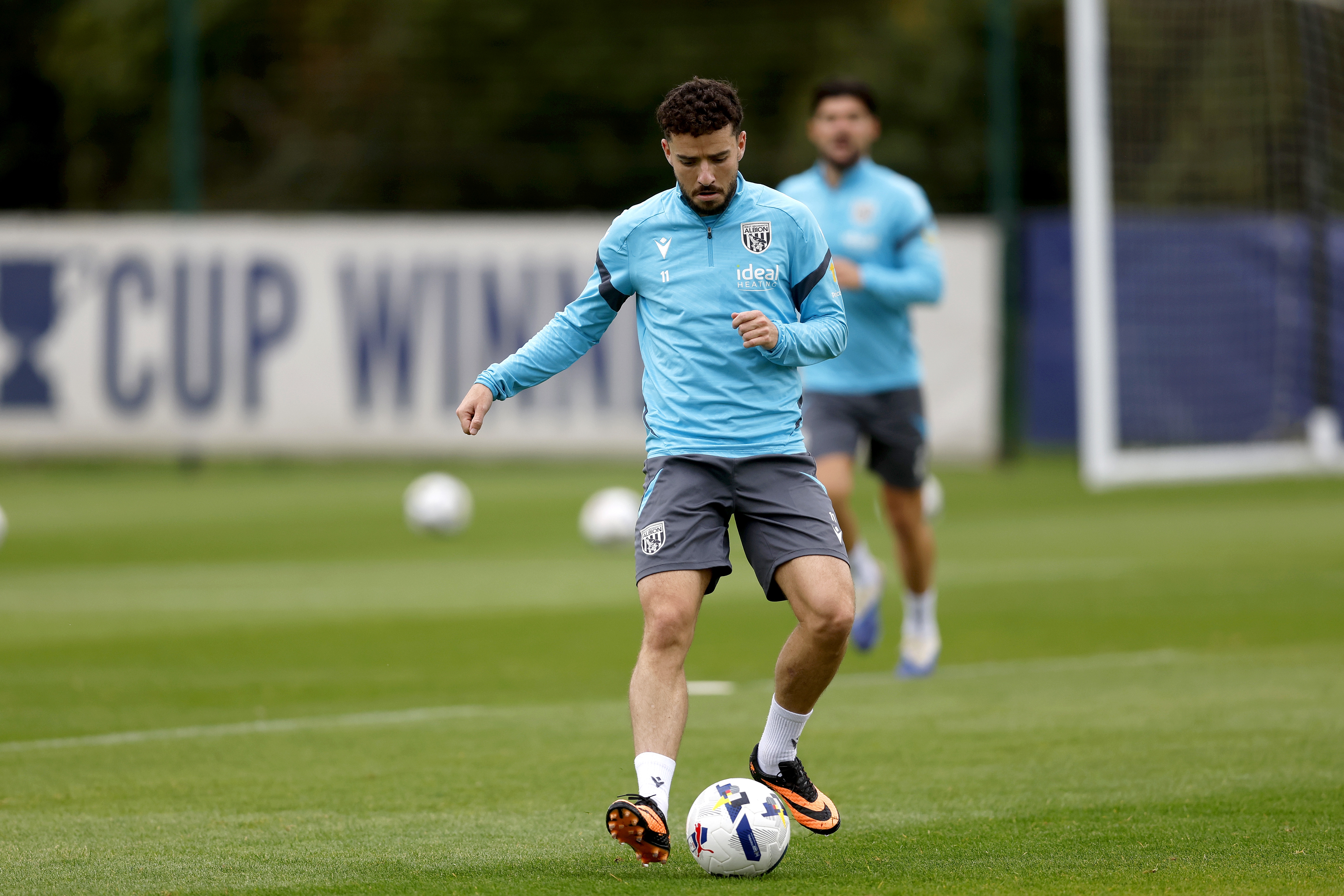 Mikey Johnston on the ball during training