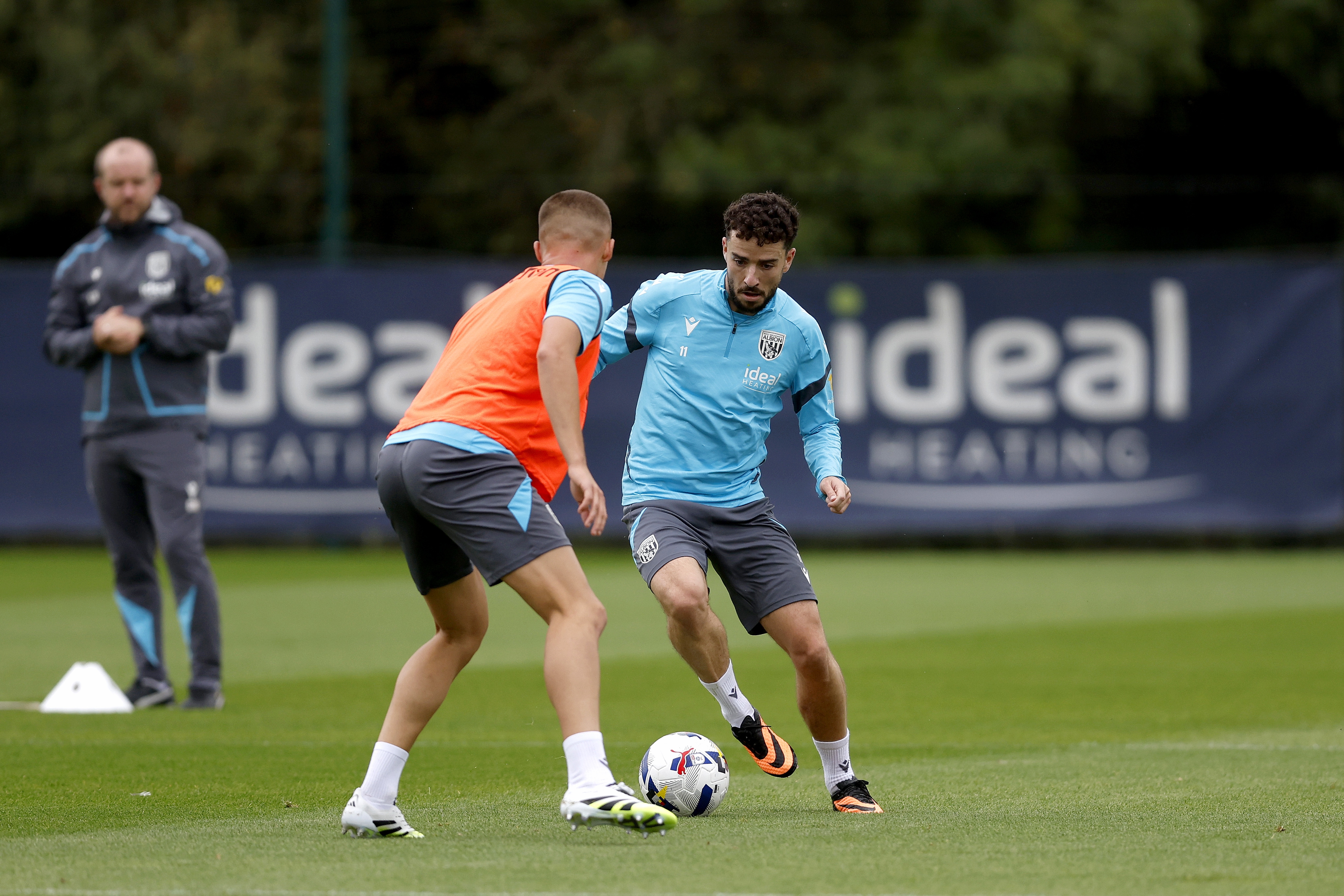 Mikey Johnston on the ball during training