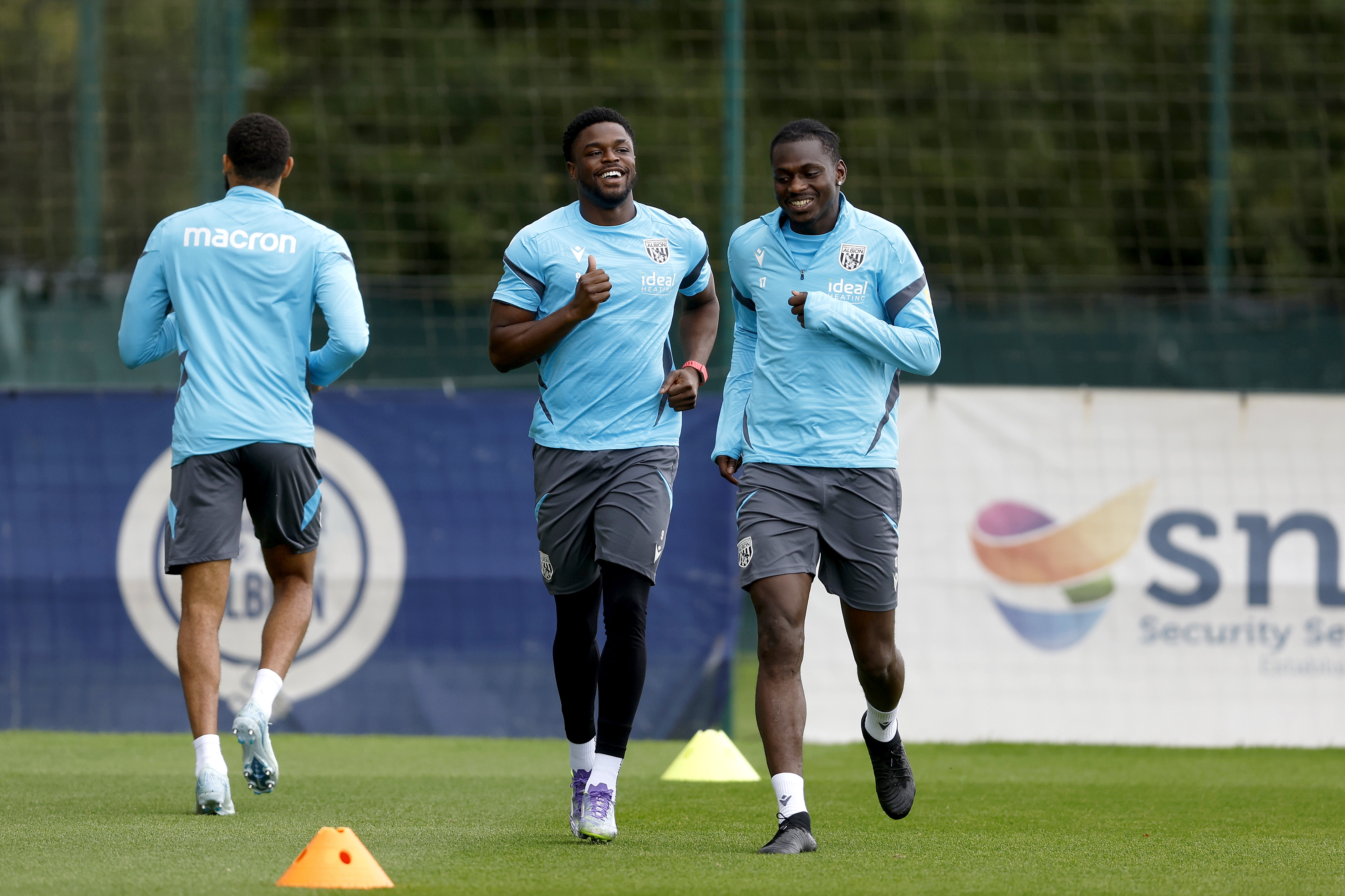 Josh Maja and Ousmane Diakité smiling during training 