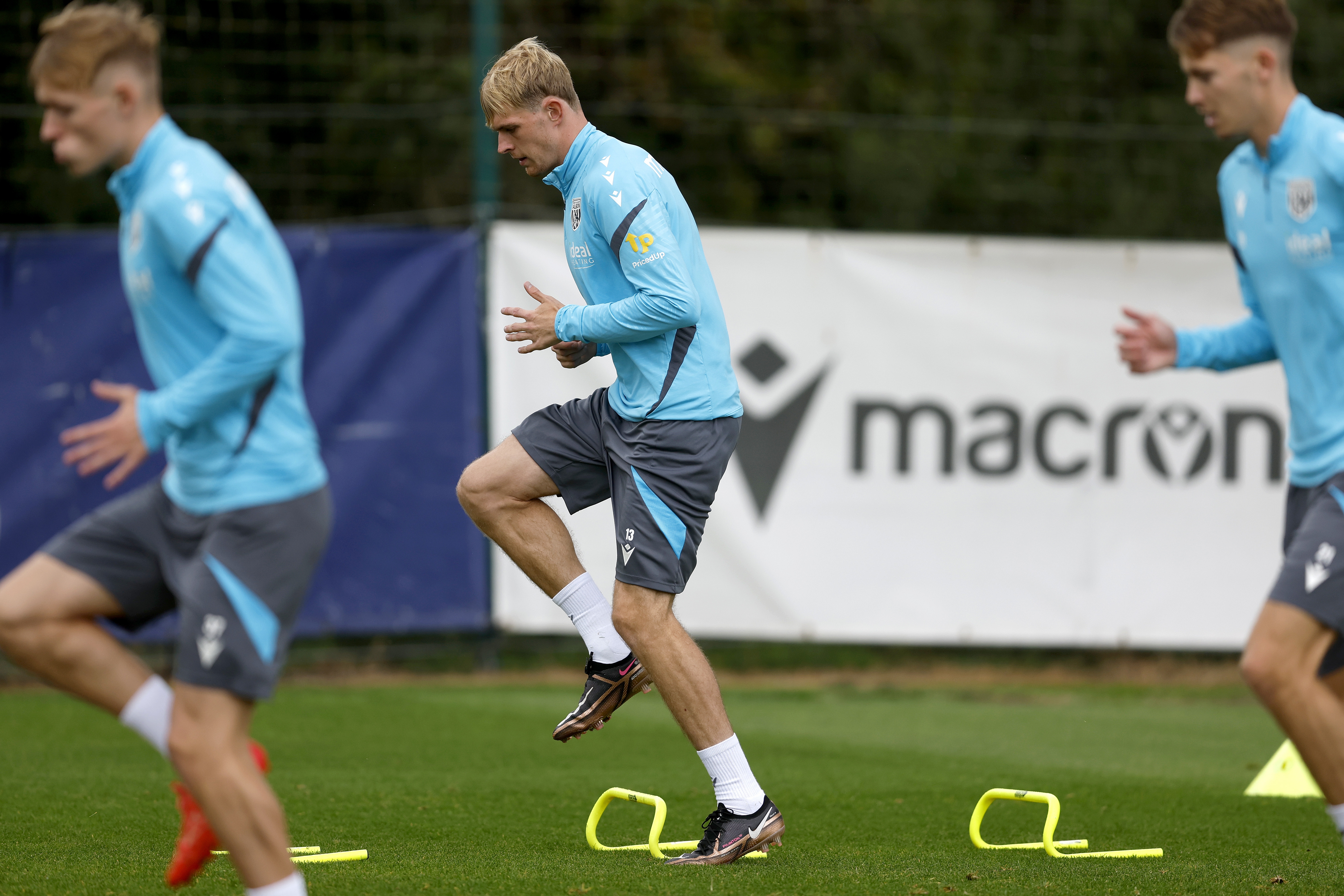 Toby Collyer warming up before training 