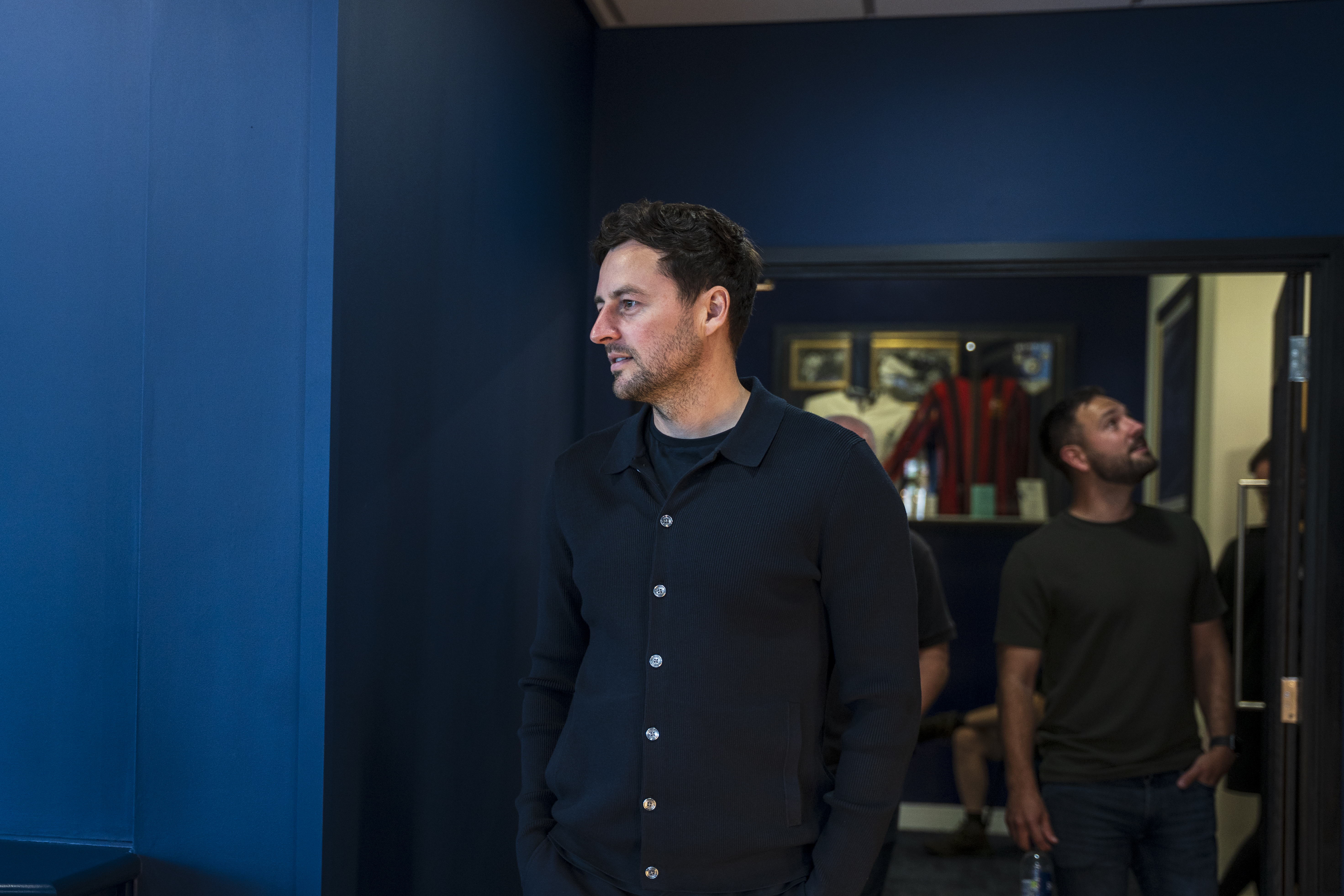 Ryan Mason walking through the East Stand looking at all the memorabilia and a specially curated gallery of 125 iconic Hawthorns images