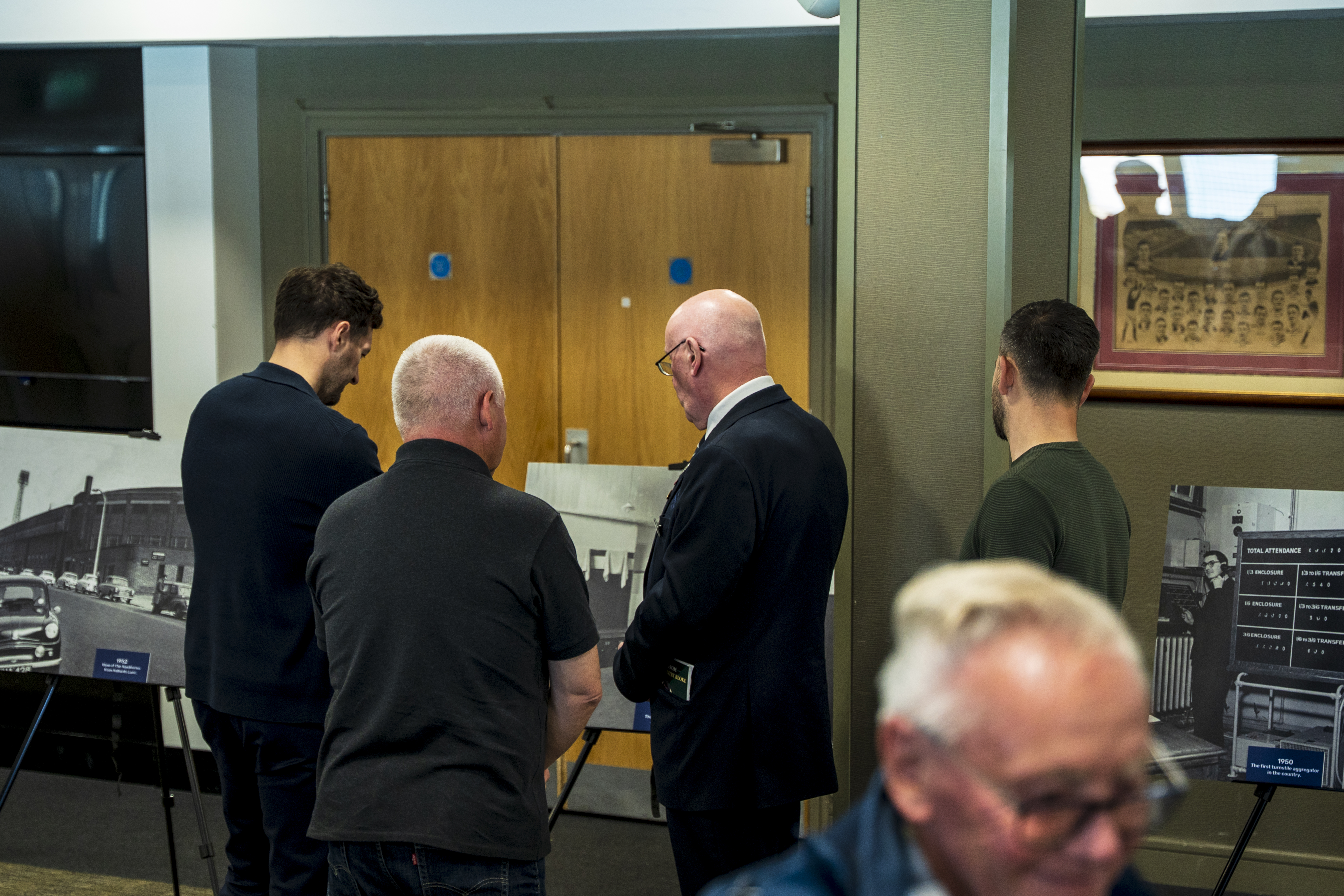 Ryan Mason walking through the East Stand looking at all the memorabilia and a specially curated gallery of 125 iconic Hawthorns images