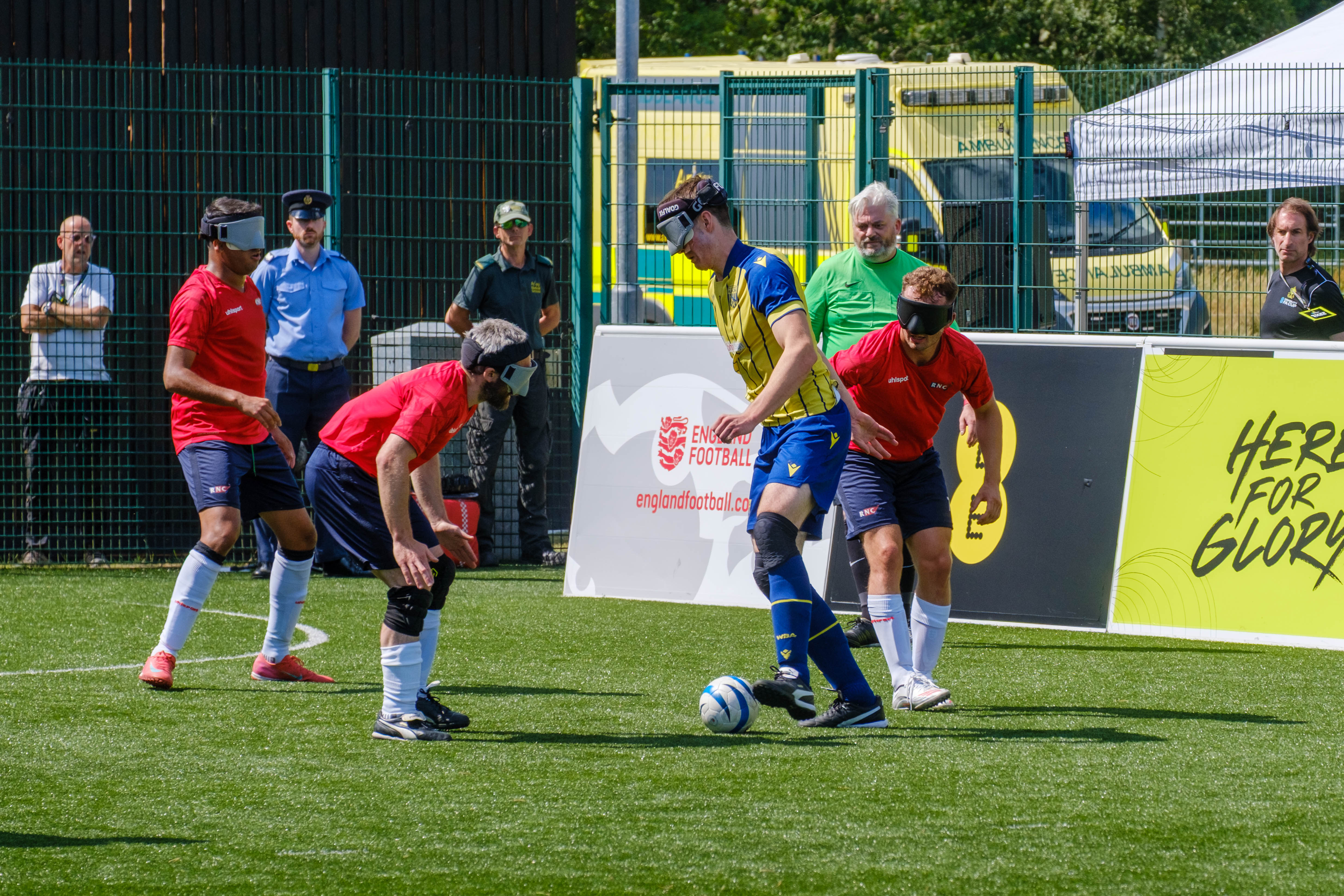 Efe Shimwell battles for possession against RNC.