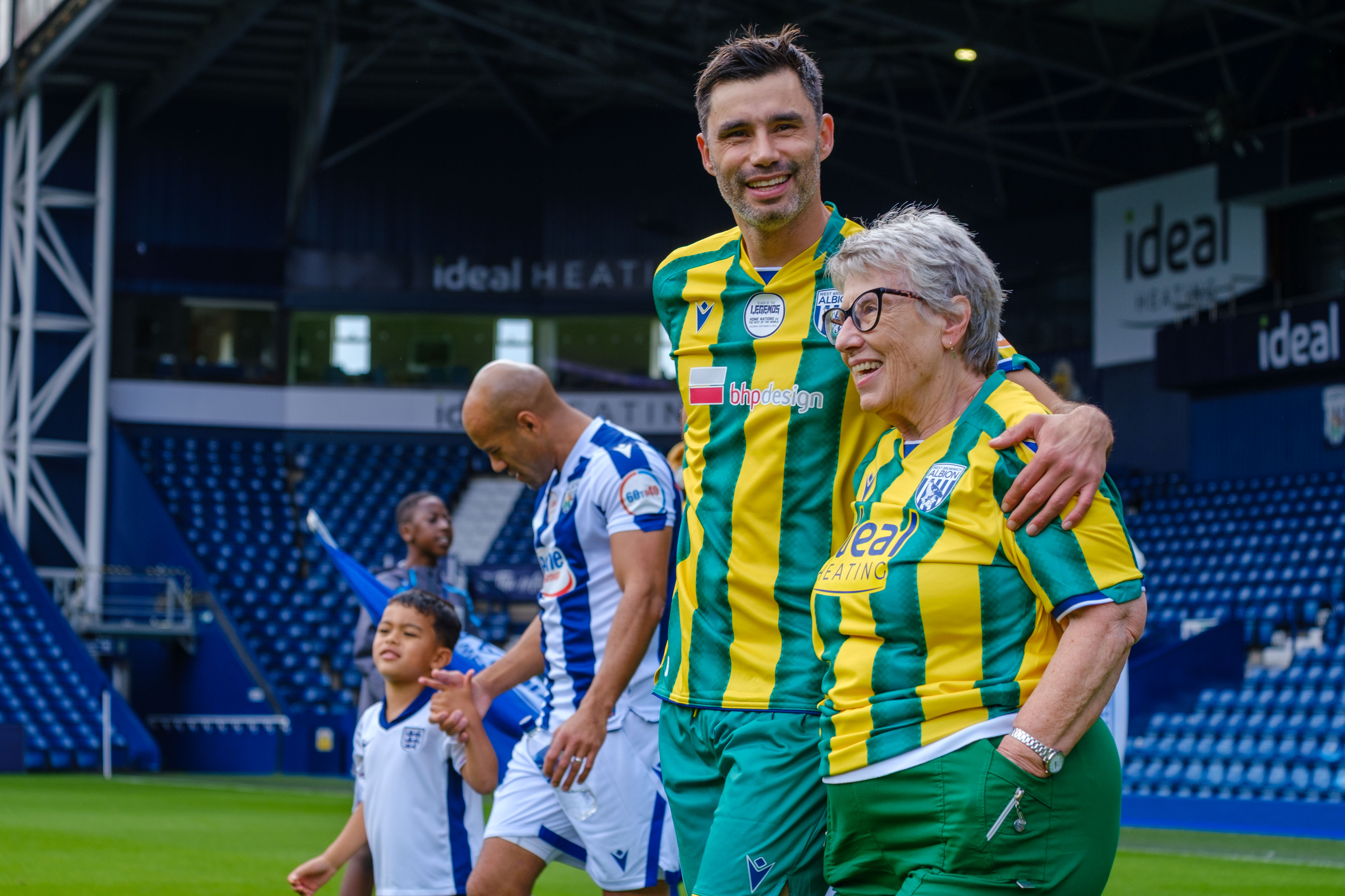 Claudio Yacob and Sandra walkout at The Hawthorns.