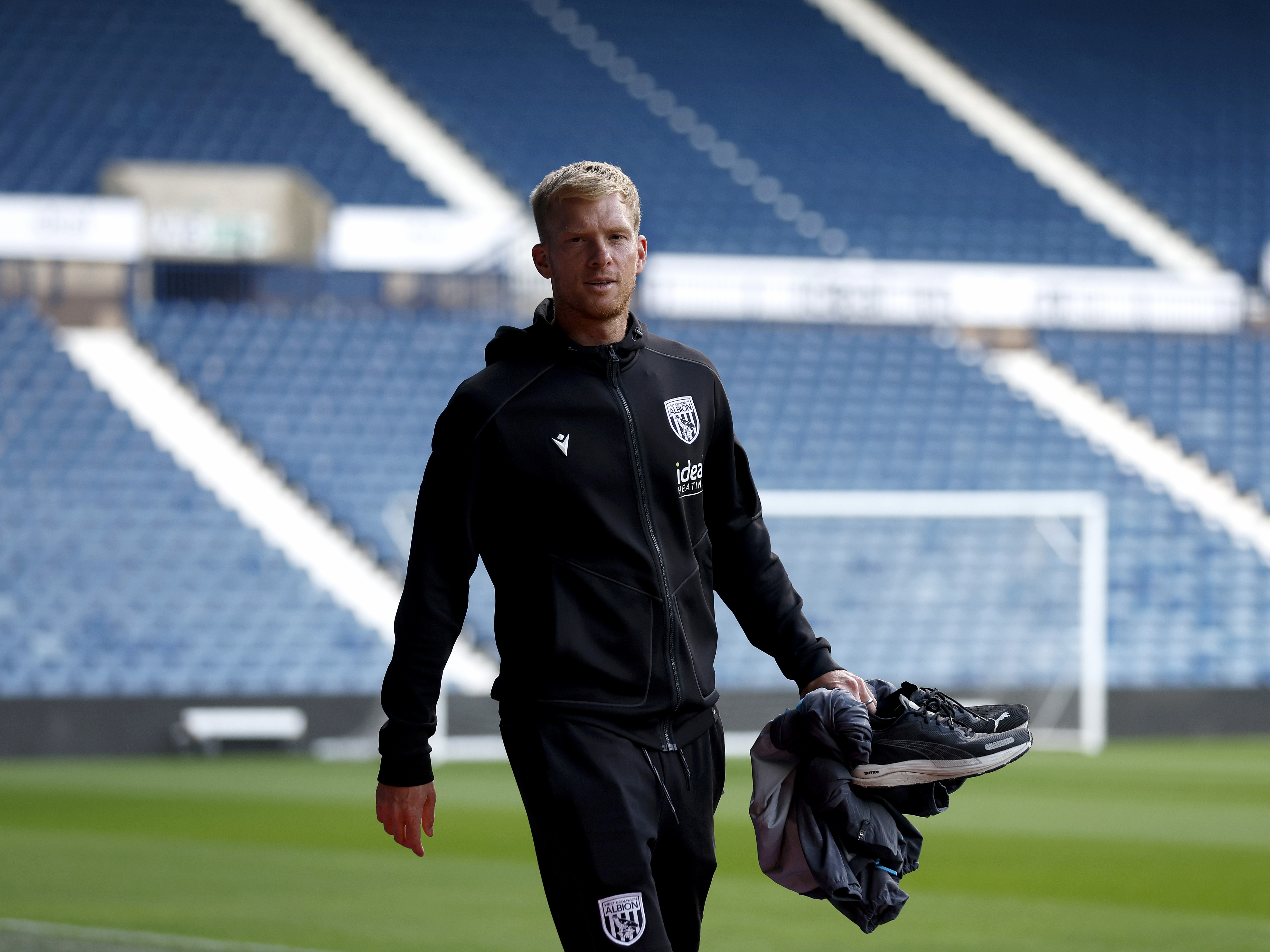 A photo of Albion U21 boss Leigh Downing arriving at The Hawthorns