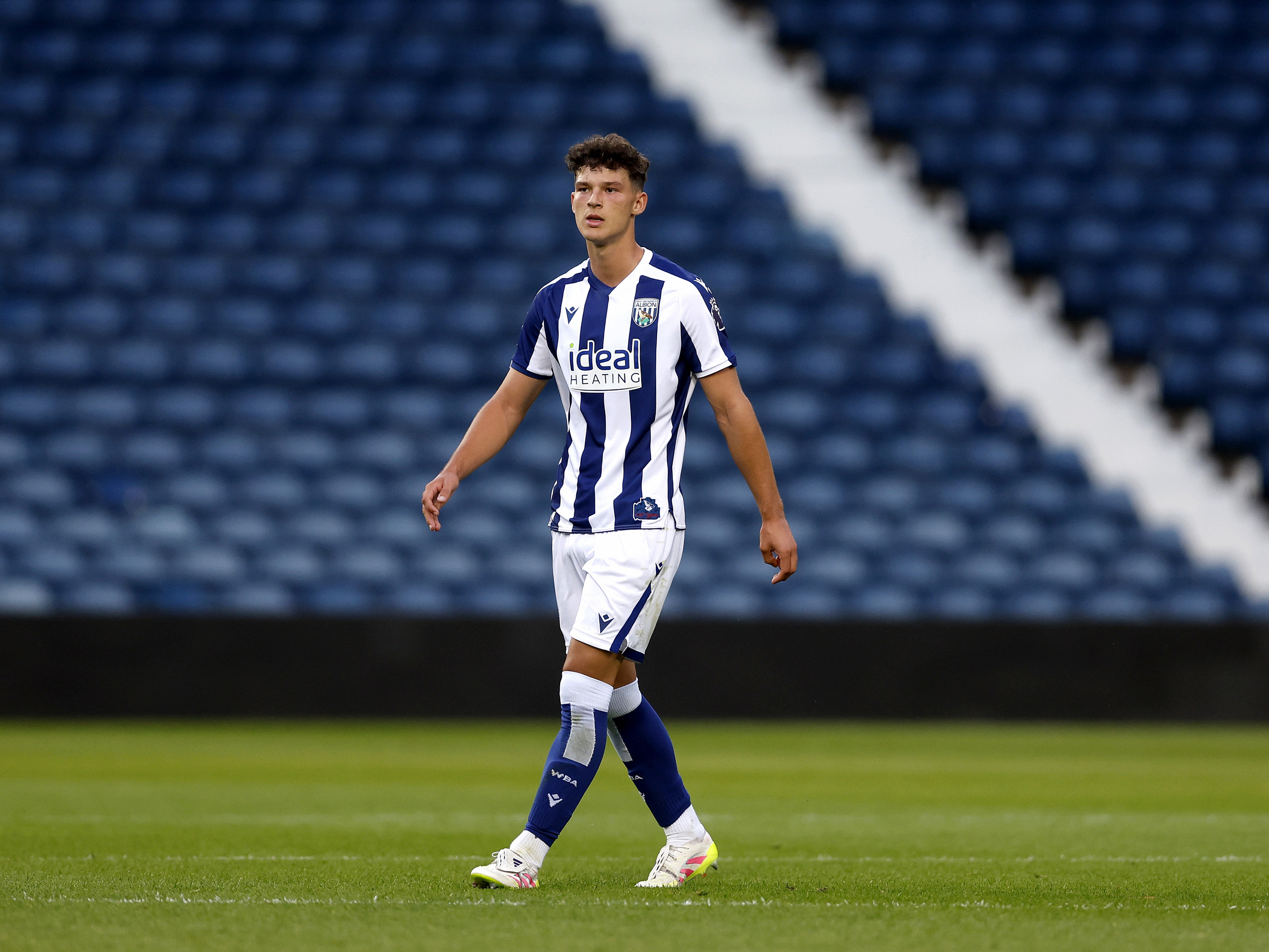A photo of U18 defender Noah DuPont in the 2025/26 home kit