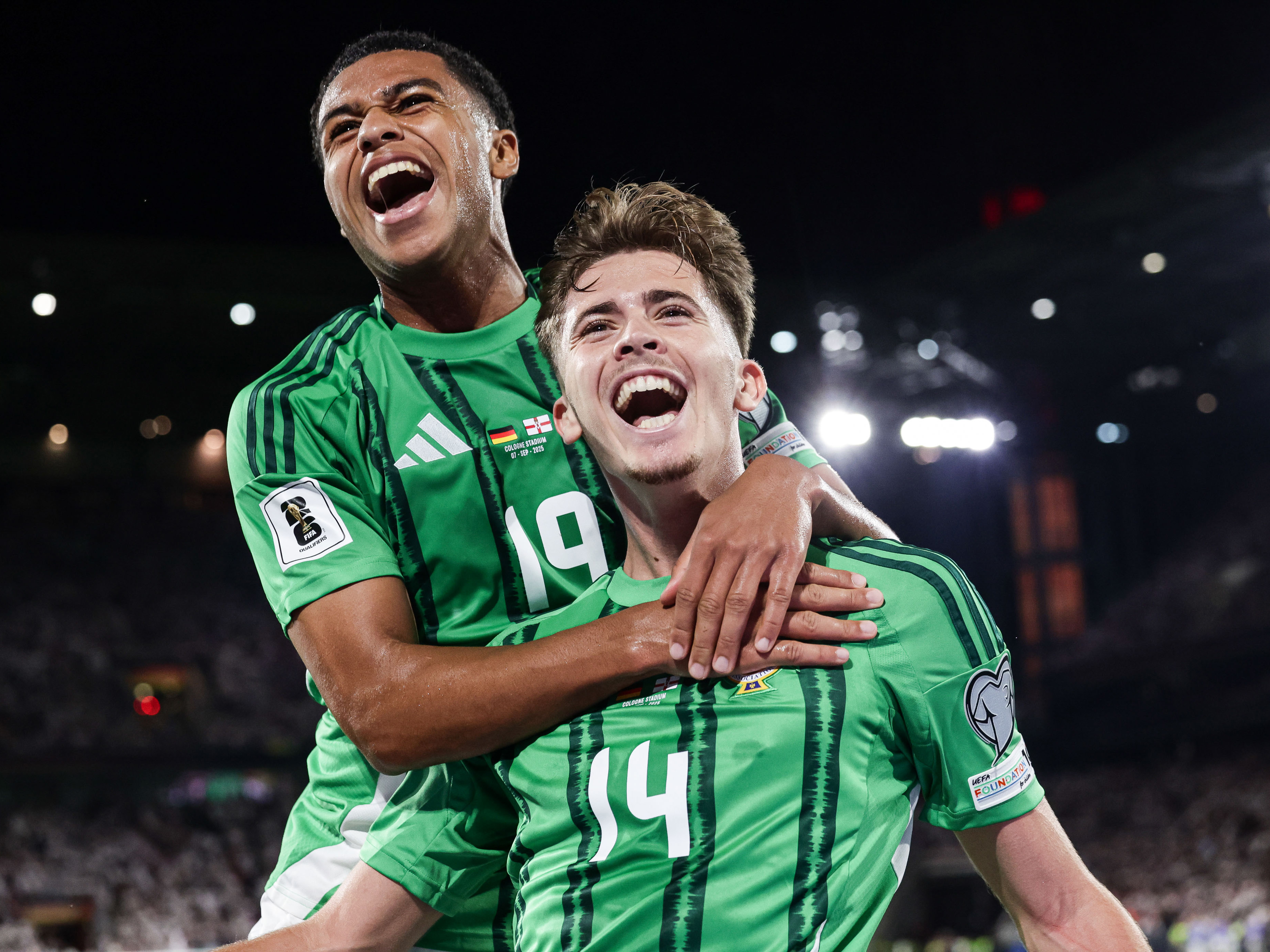 Isaac Price celebrates scoring for Northern Ireland against Germany