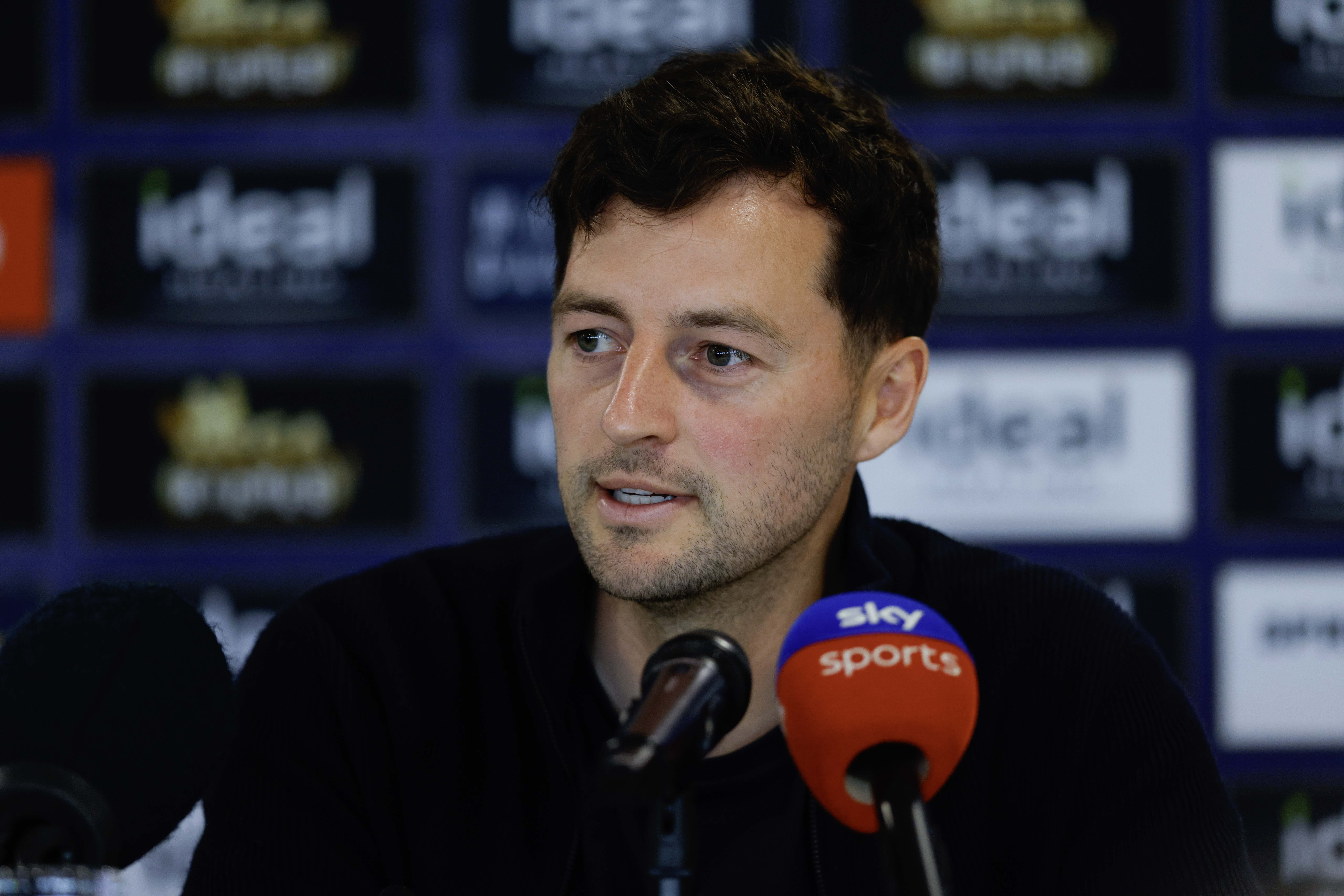 Ryan Mason speaking to the media during a press conference 