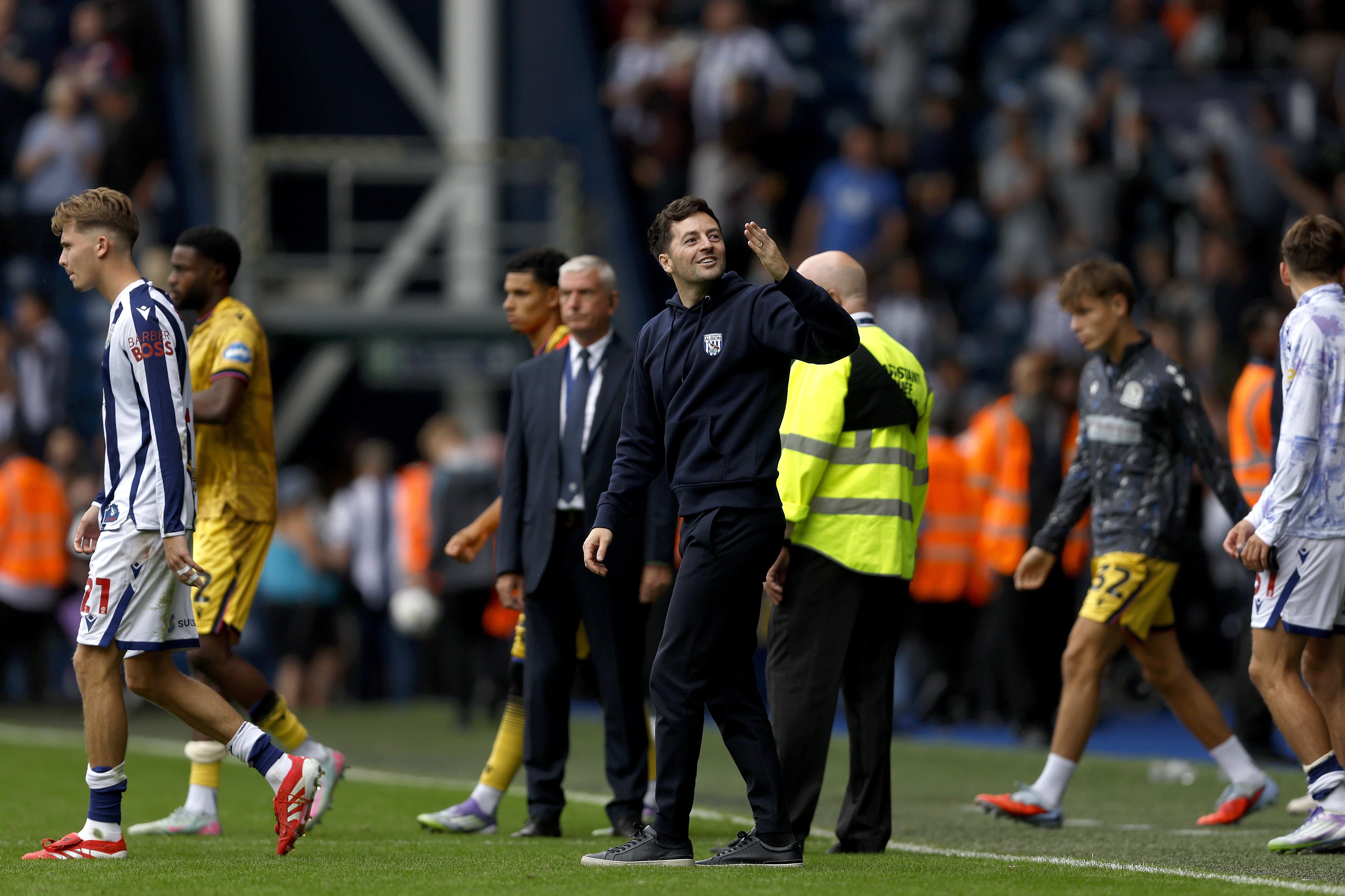 Ryan Mason blows a kiss to the stands after a game at The Hawthorns 