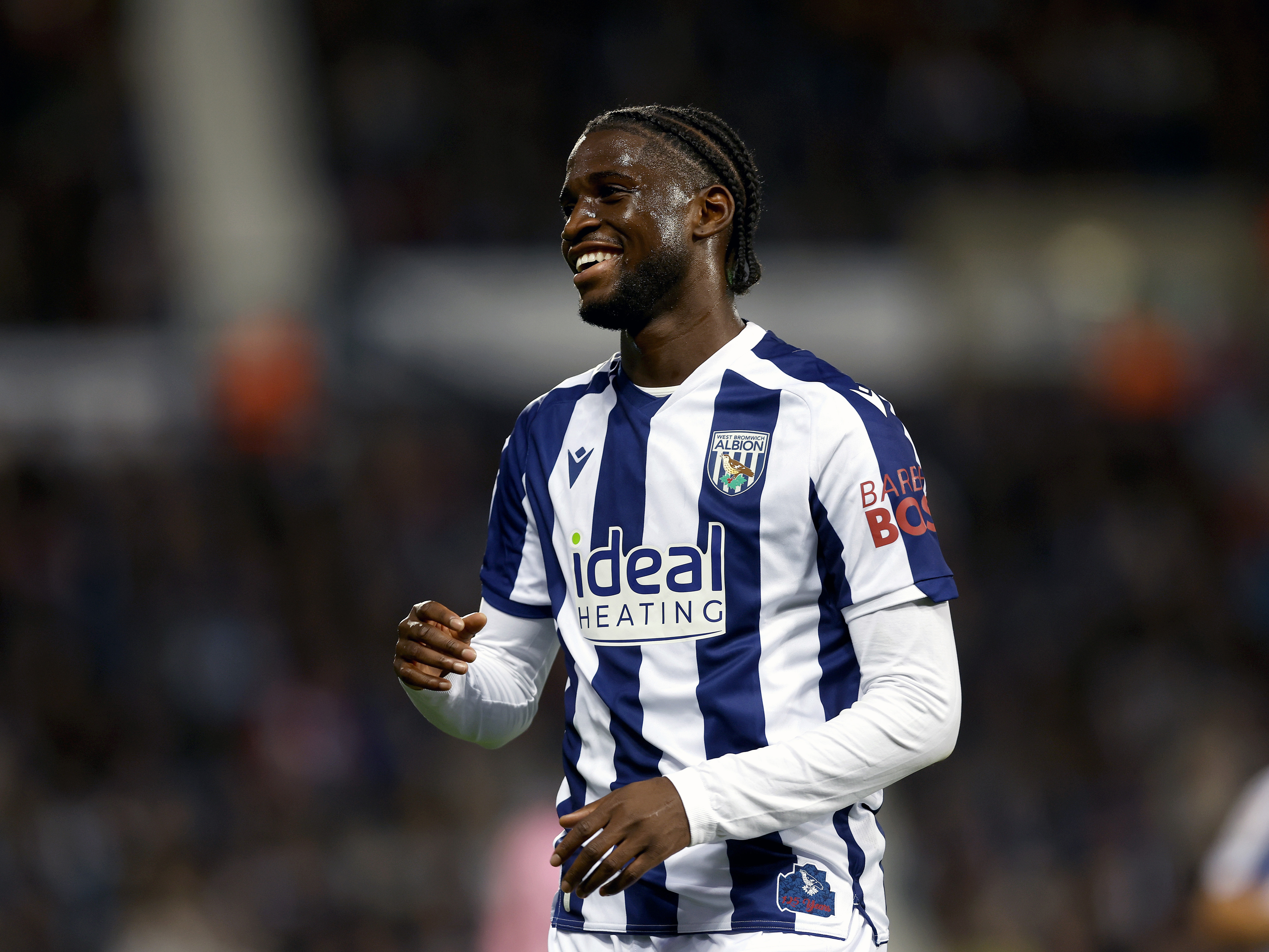 An image of Sam Iling-Junior smiling after his goal against Leicester