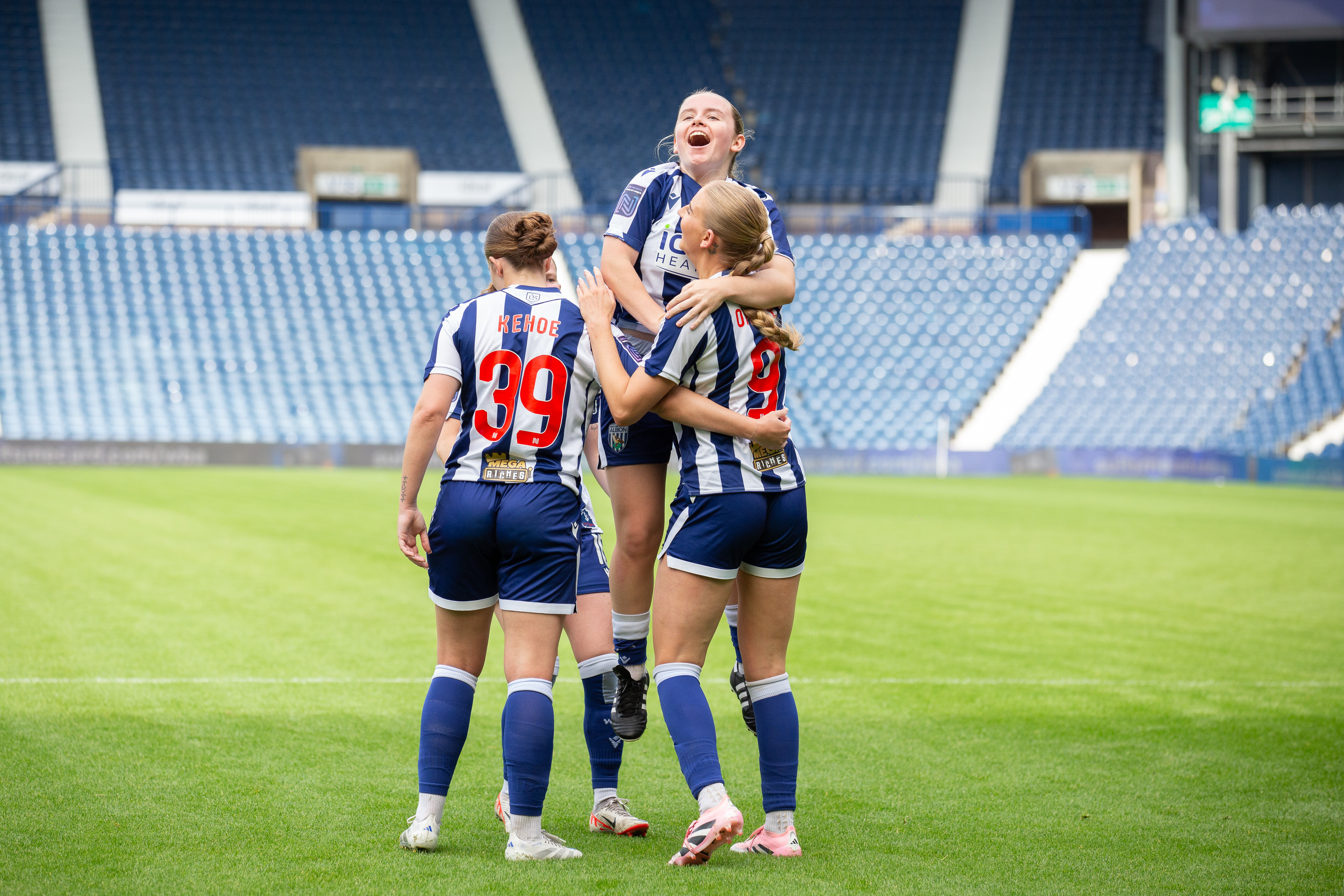 Albion Women celebrate.
