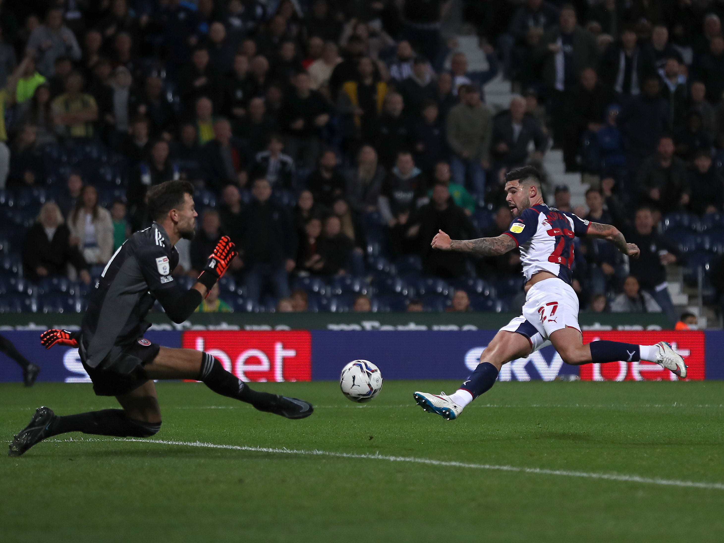 A photo of Albion midfielder Alex Mowatt scoring against Sheffield United in 2021