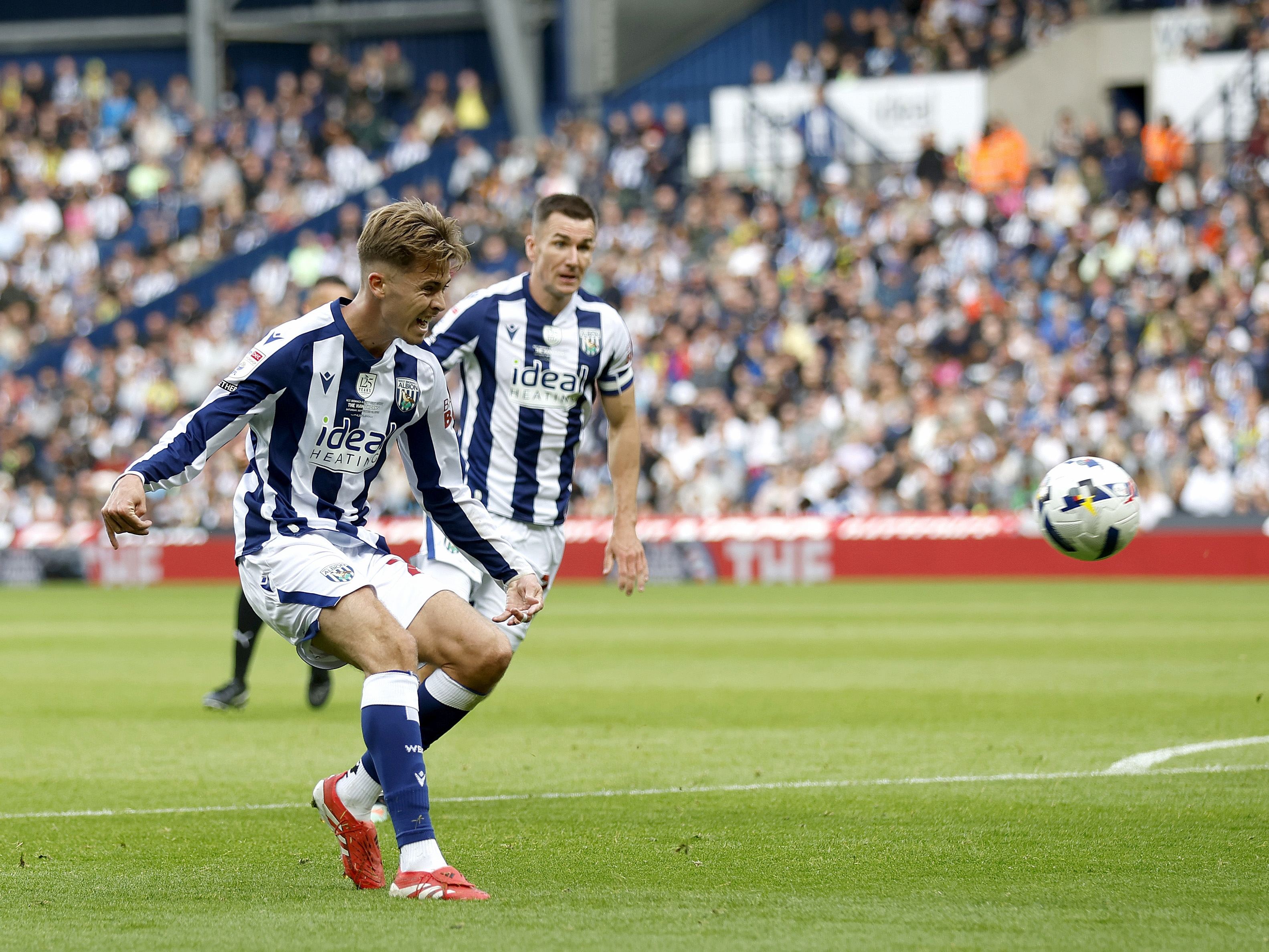 An image of Isaac Price shooting against Derby