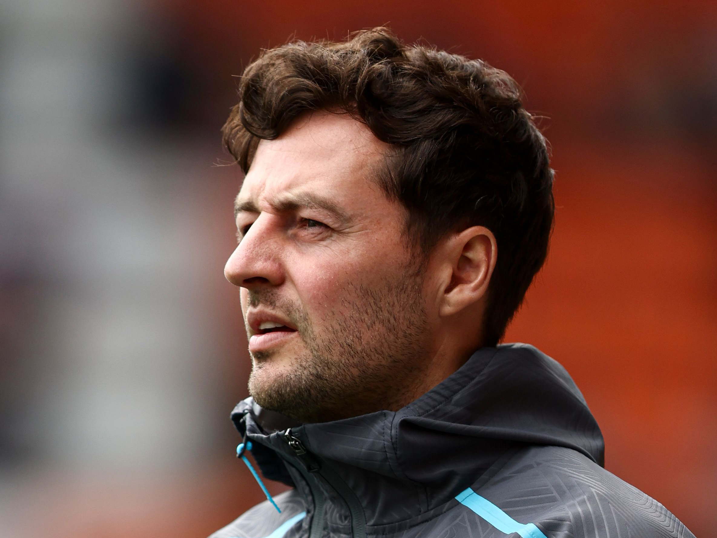 A close up of the side of Ryan Mason's face